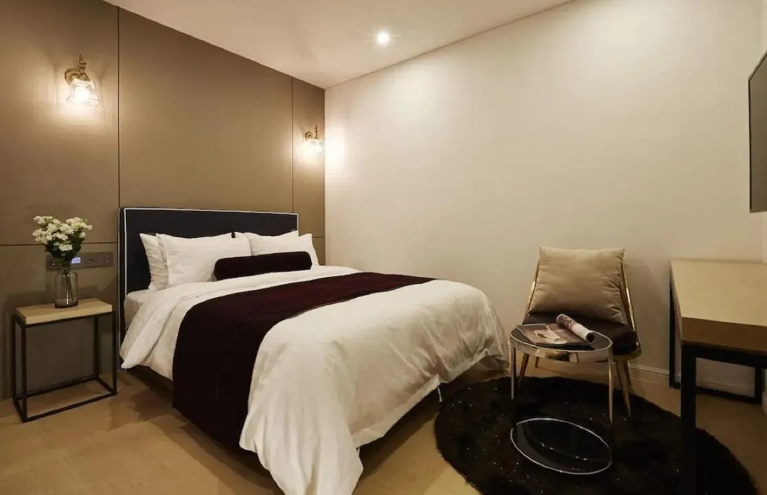 Photo of the whole room, Bed in Urban Island Hotel Jeju