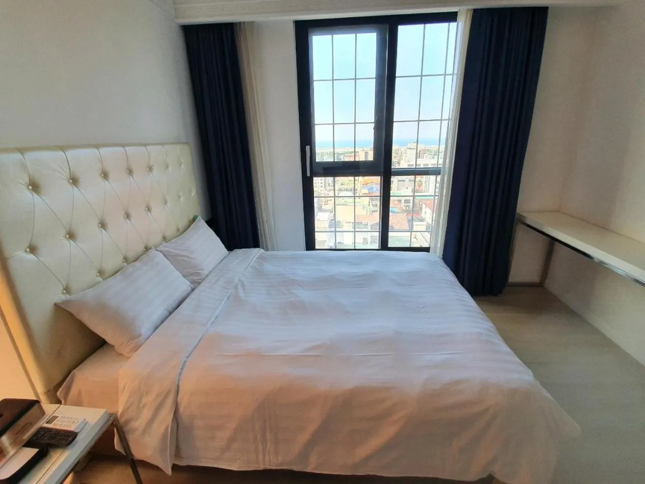 Bed in Urban Island Hotel Jeju