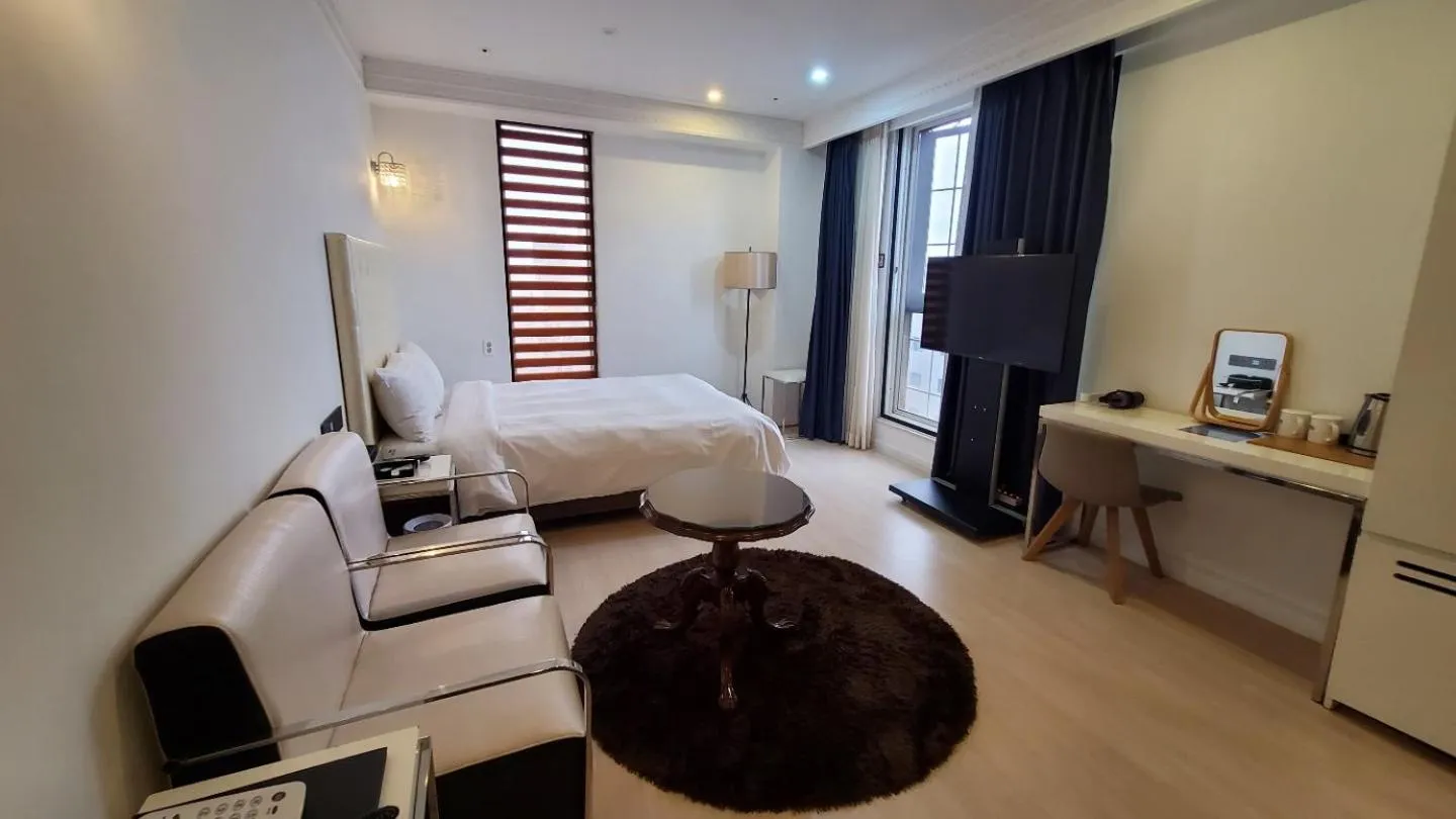 Bed in Urban Island Hotel Jeju