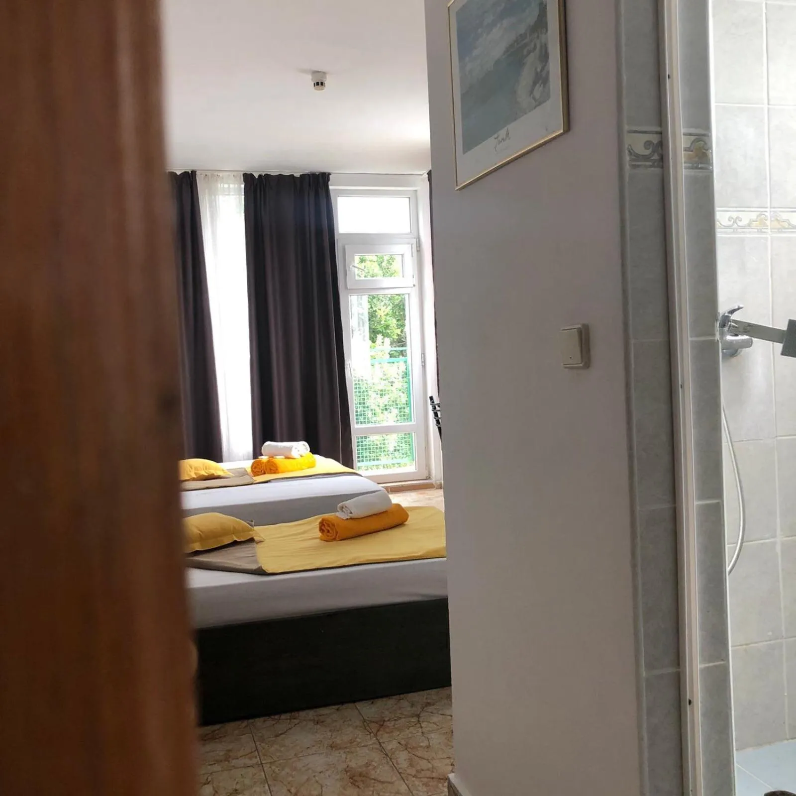 Bed in Sunny Varshava Hotel