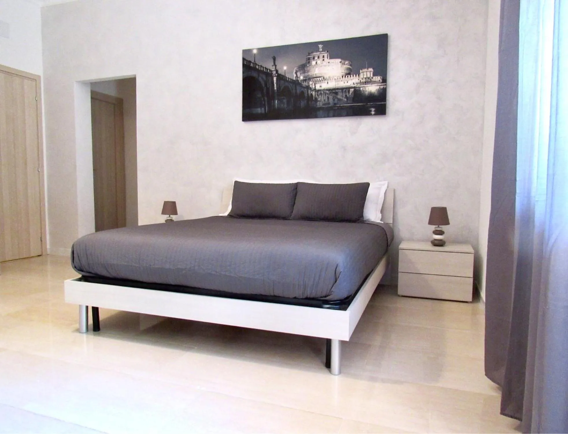 Bed in Roema Guest House