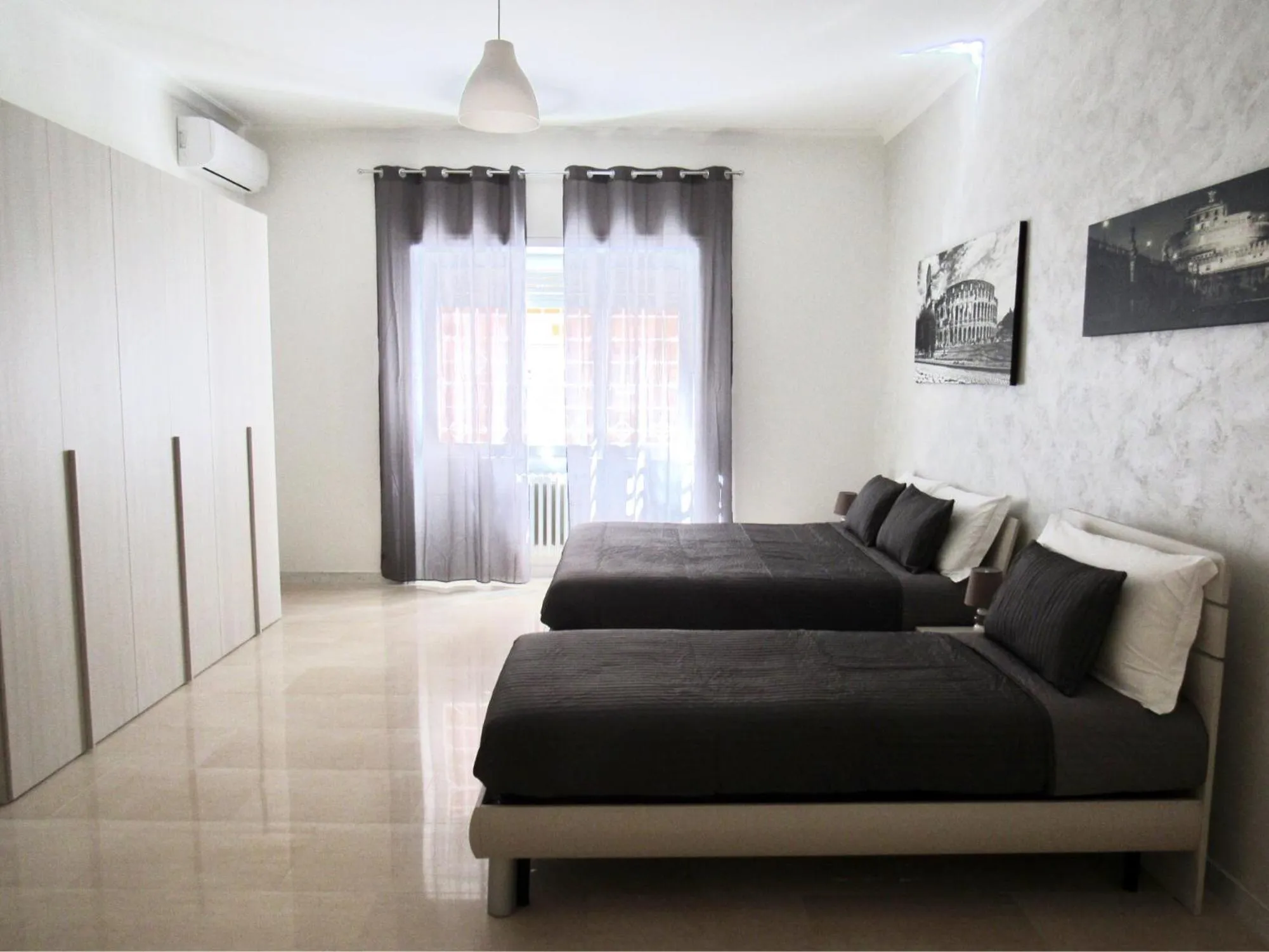 Bed in Roema Guest House