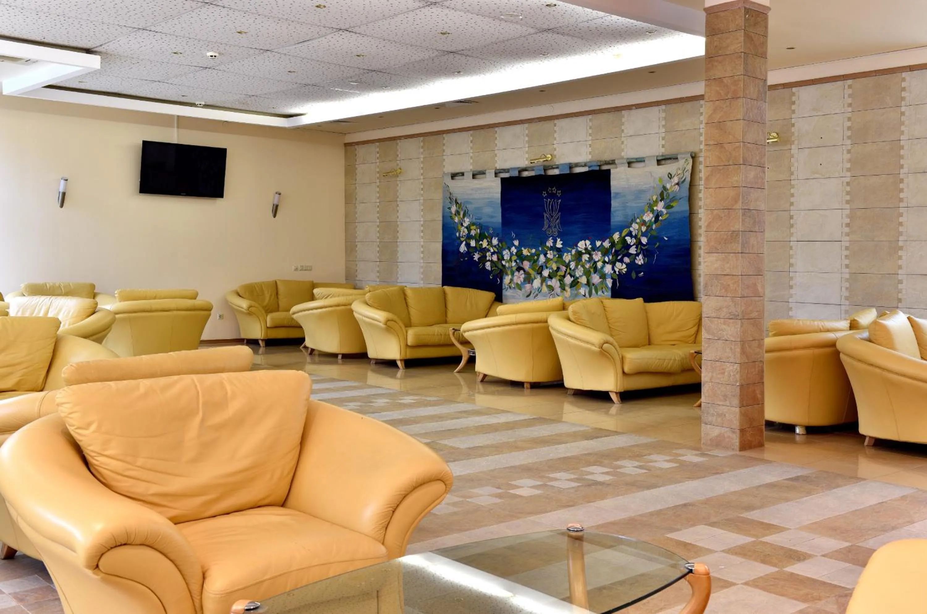 Lobby or reception in Les Magnolias Hotel