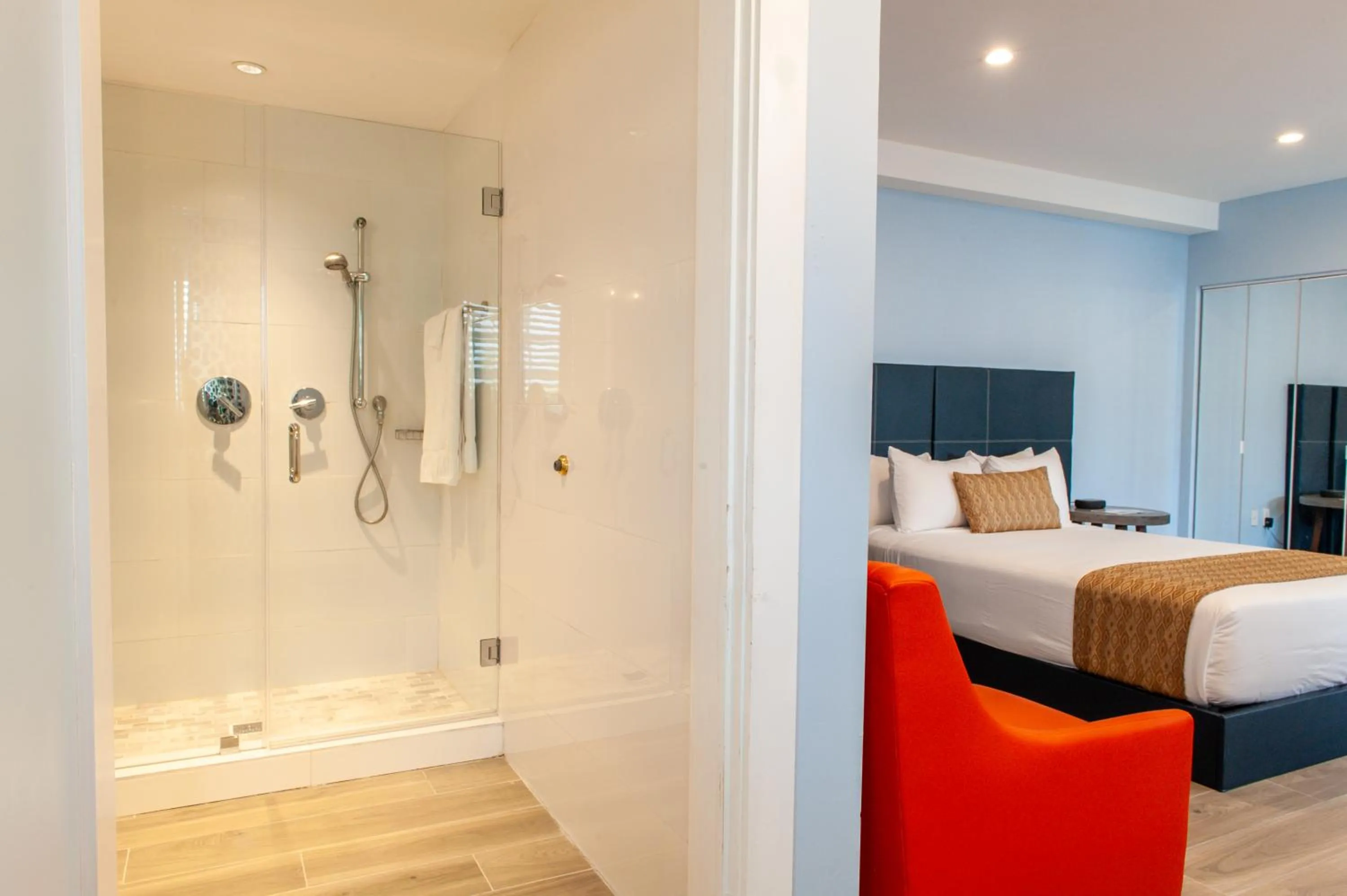 Bed in Oceanside Hotel and Suites