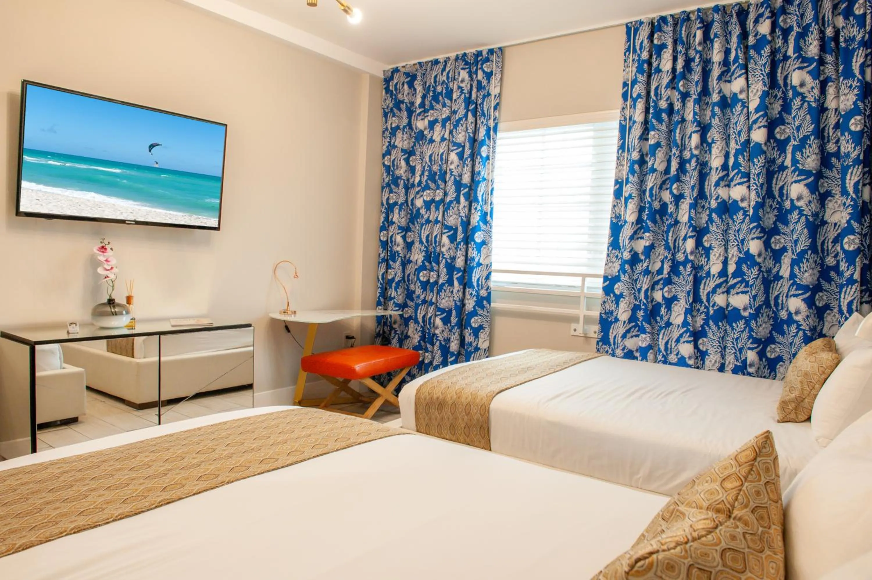 Bed in Oceanside Hotel and Suites