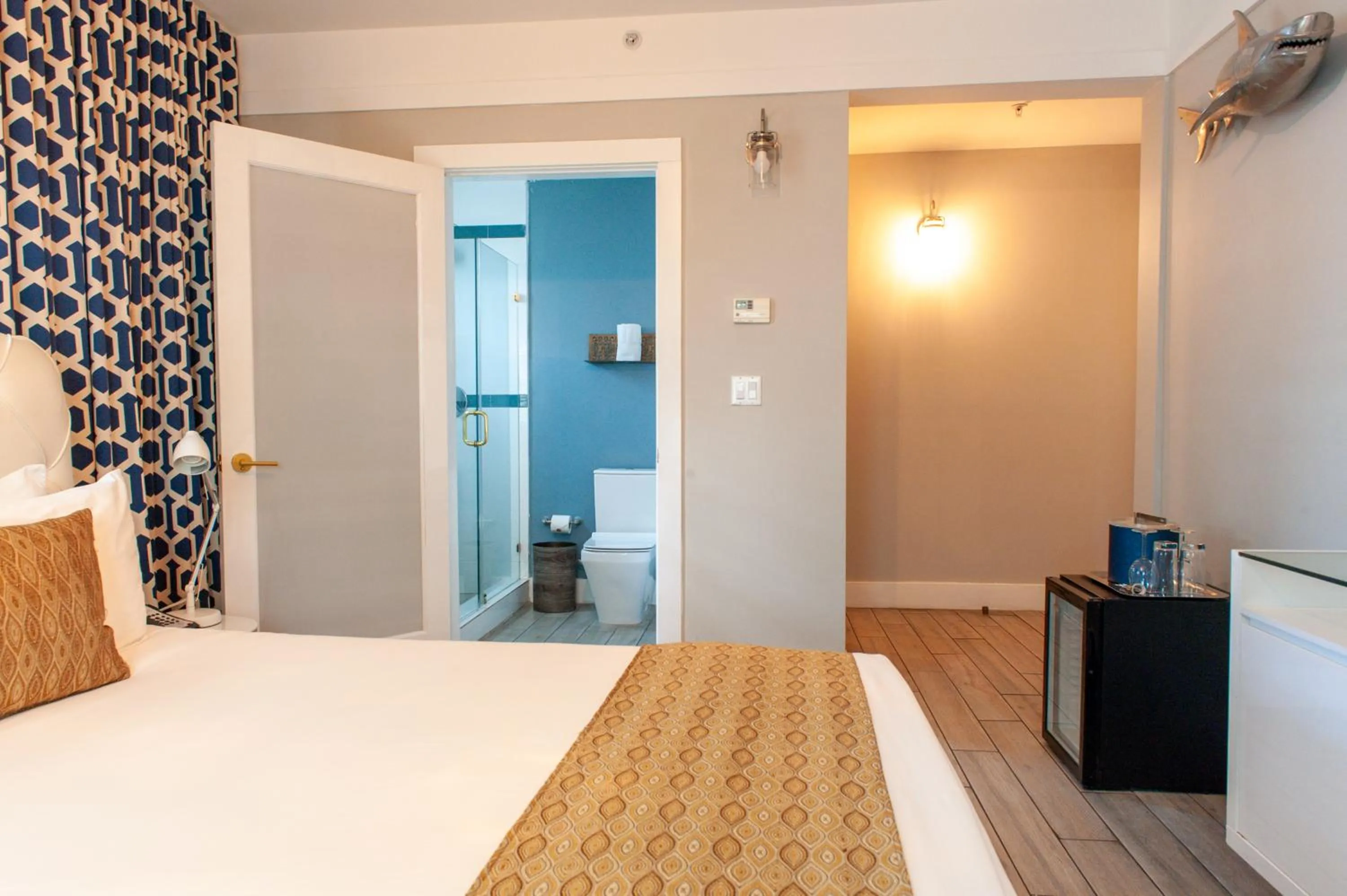 Photo of the whole room, Bed in Oceanside Hotel and Suites