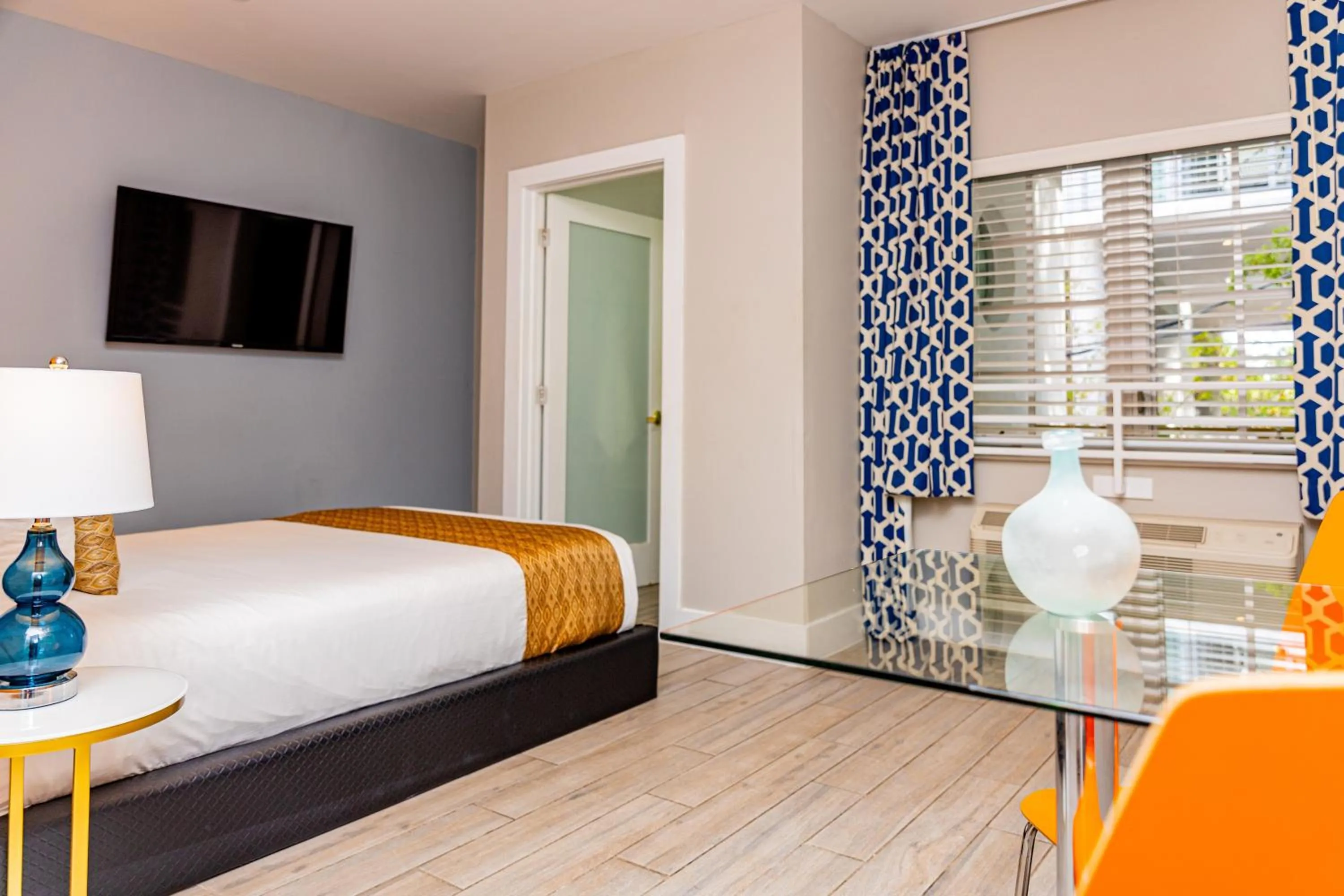 Bed in Oceanside Hotel and Suites