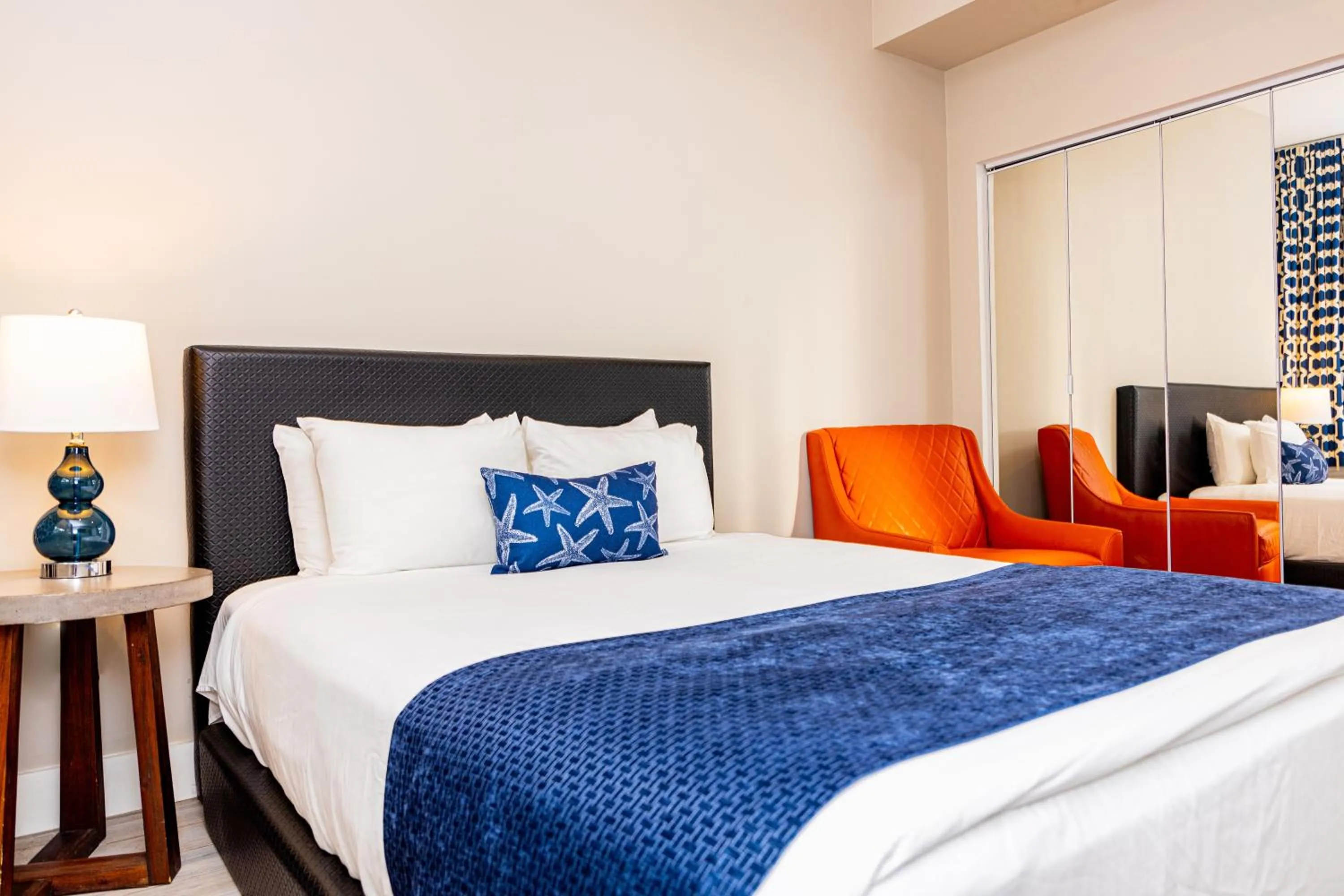 Bed in Oceanside Hotel and Suites