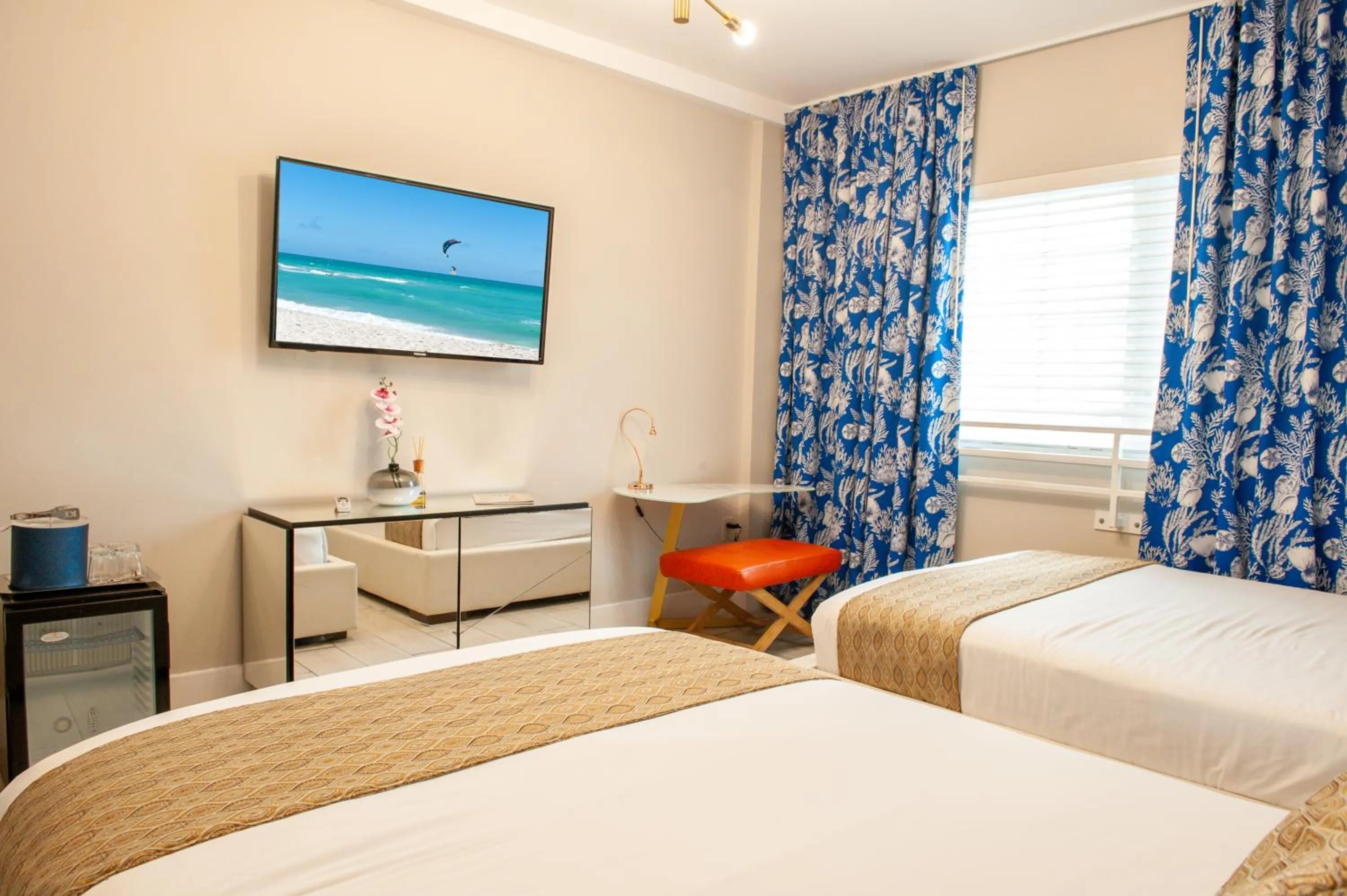 Bed in Oceanside Hotel and Suites