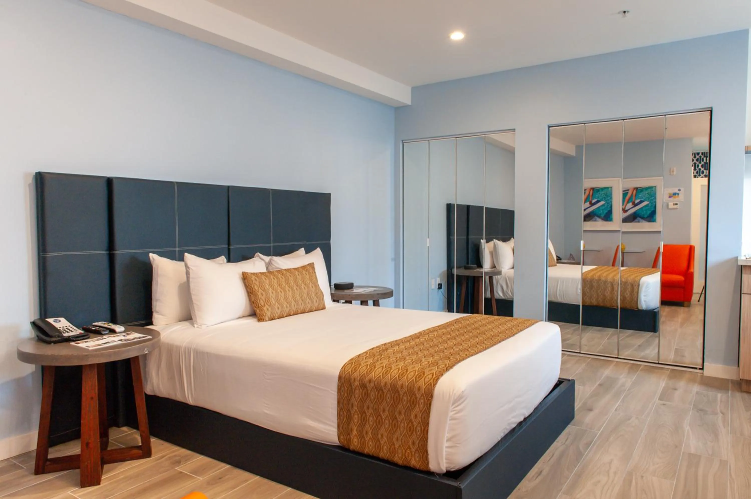 Bed in Oceanside Hotel and Suites