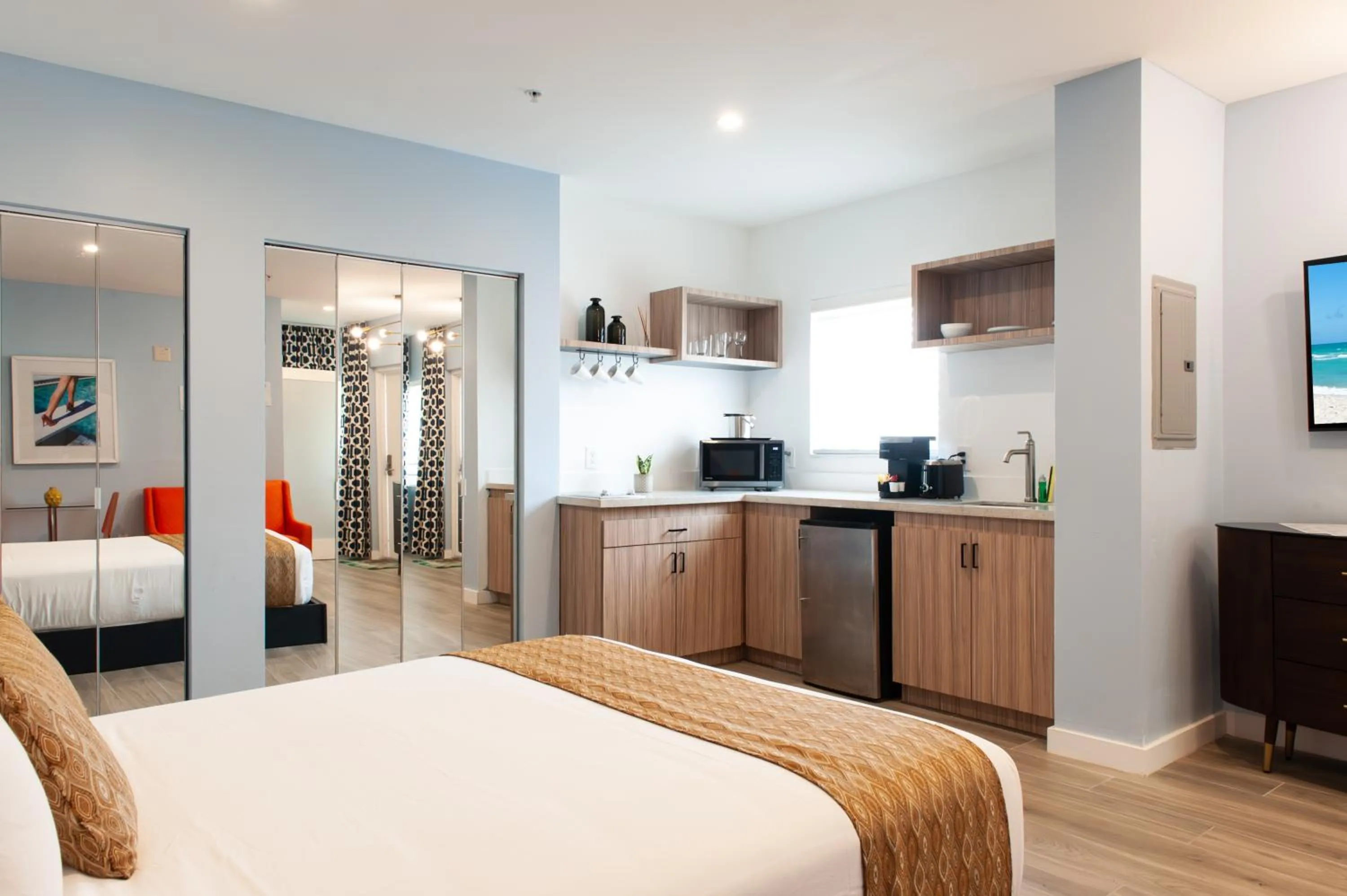 Bed in Oceanside Hotel and Suites