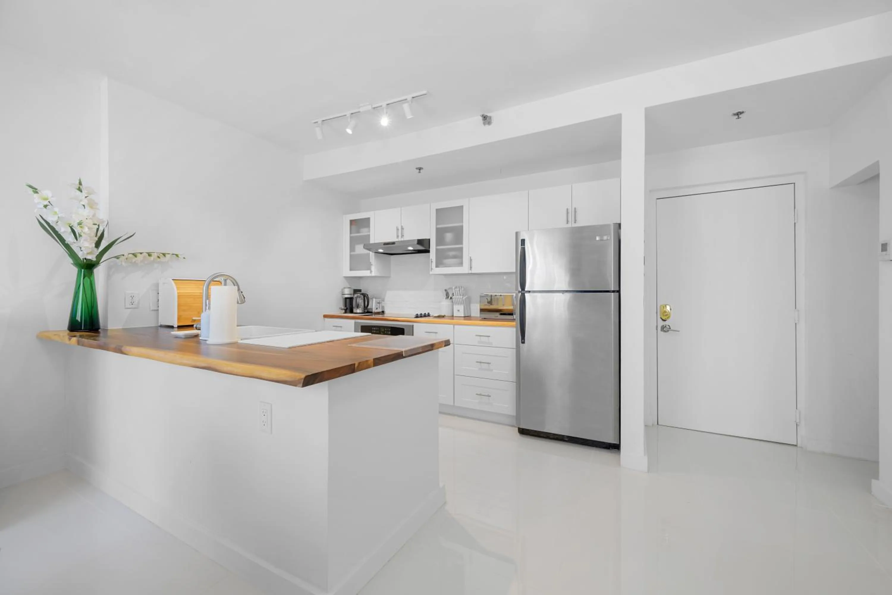 Kitchen or kitchenette in Sage on Ocean Drive Apartments