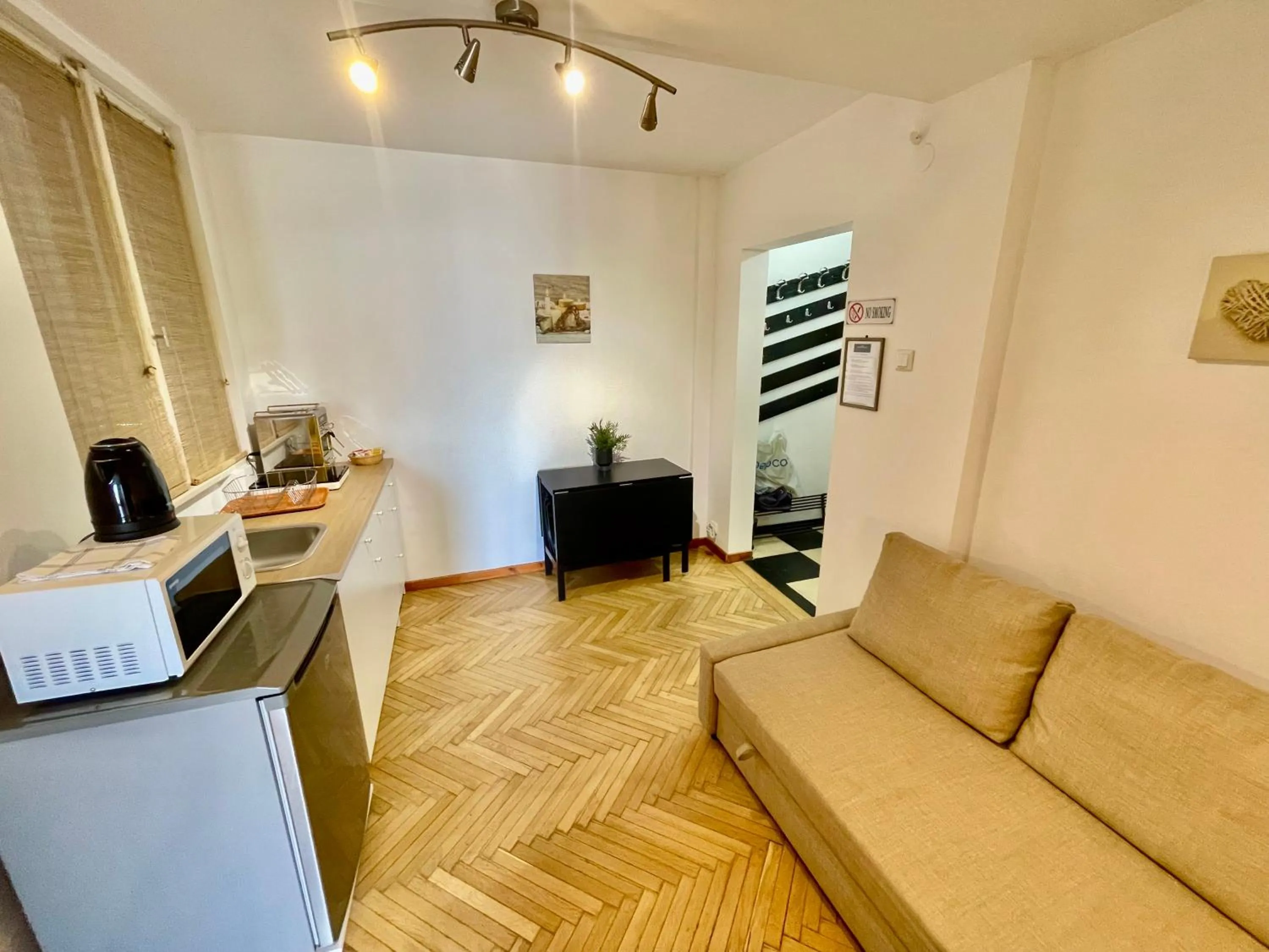 Kitchen or kitchenette in Metropole Apartments - Old City