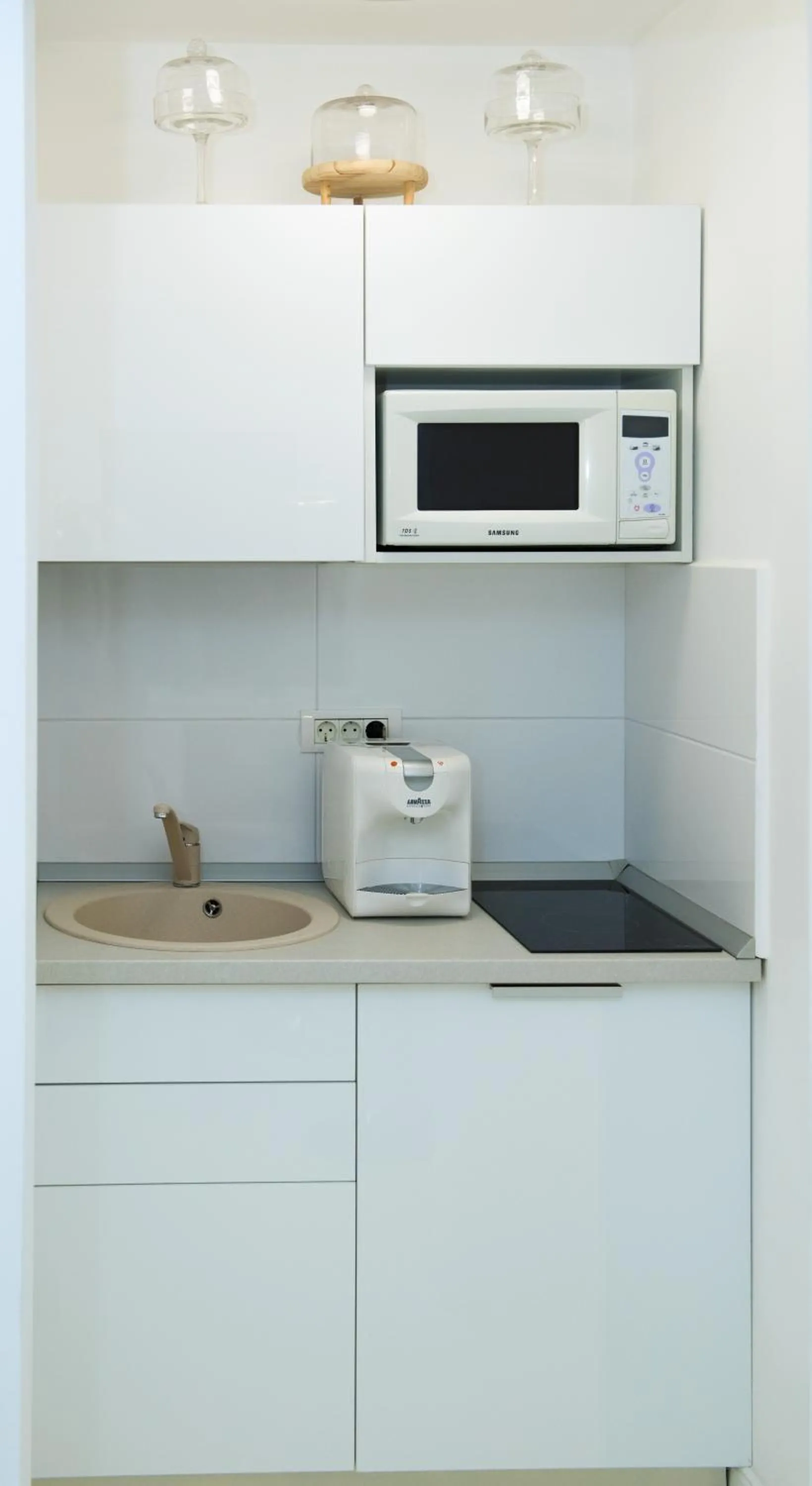 Kitchen or kitchenette in Metropole Apartments - Old City