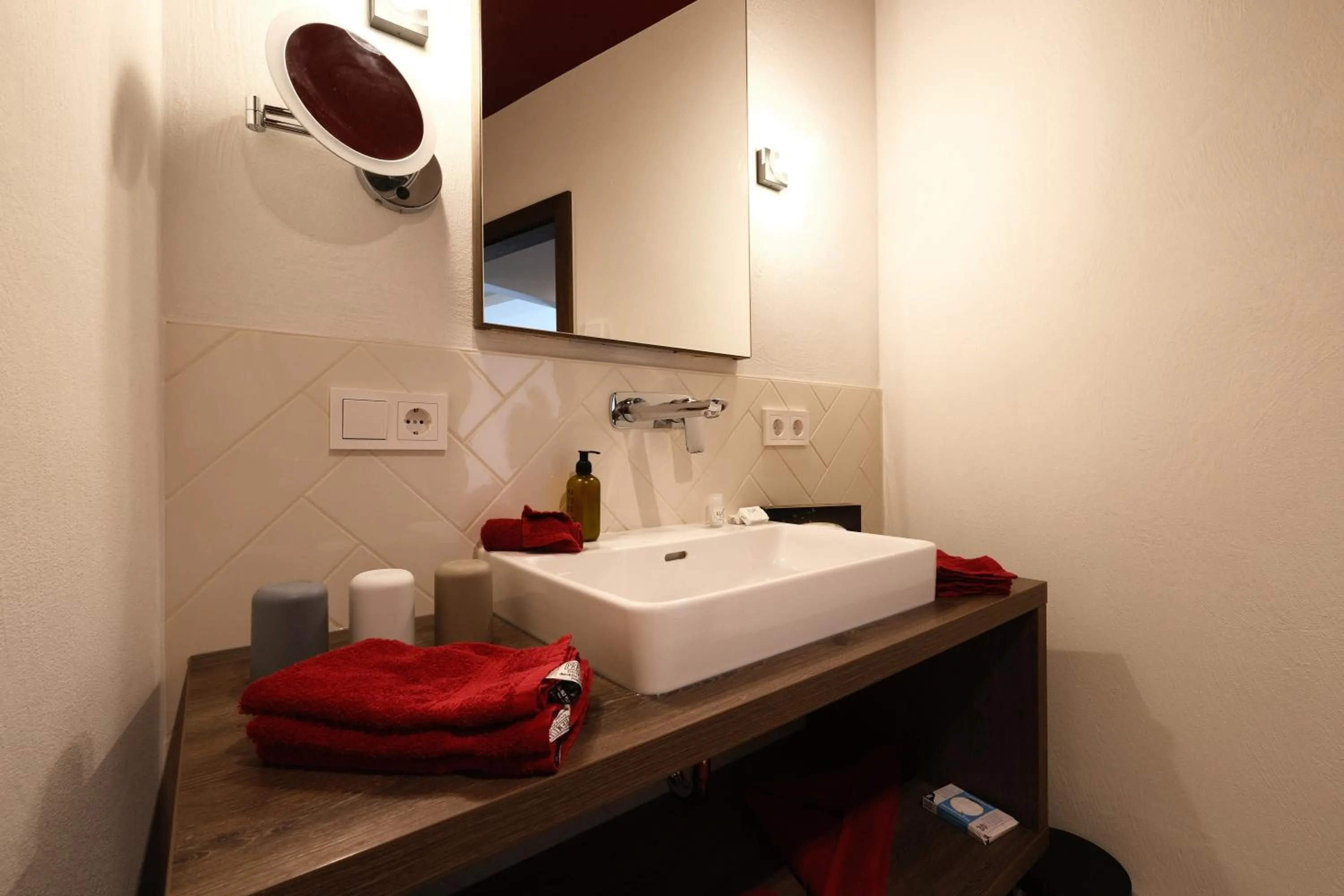 Bathroom in SeeHotel & SeeApartments Kärntnerhof- direkt am See!