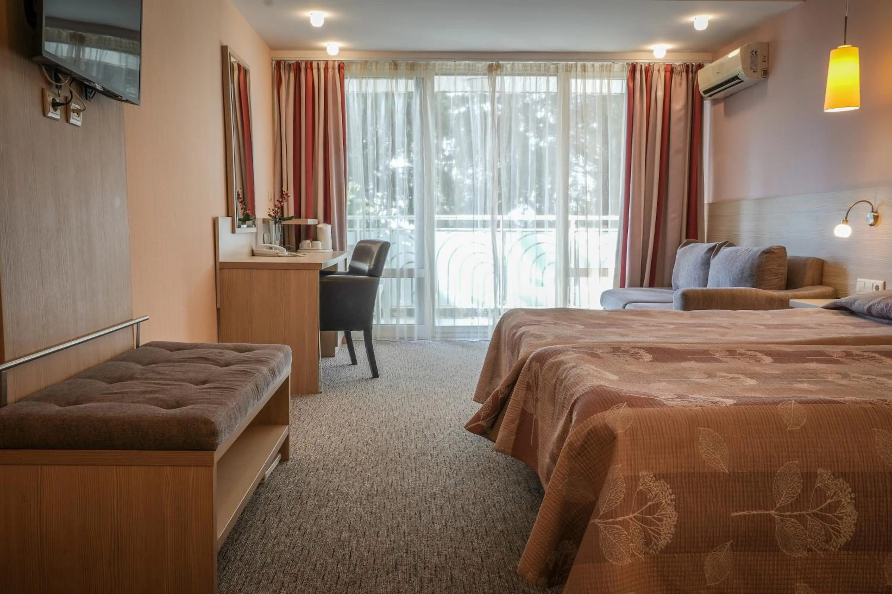 Bed in Hotel Sandy Beach