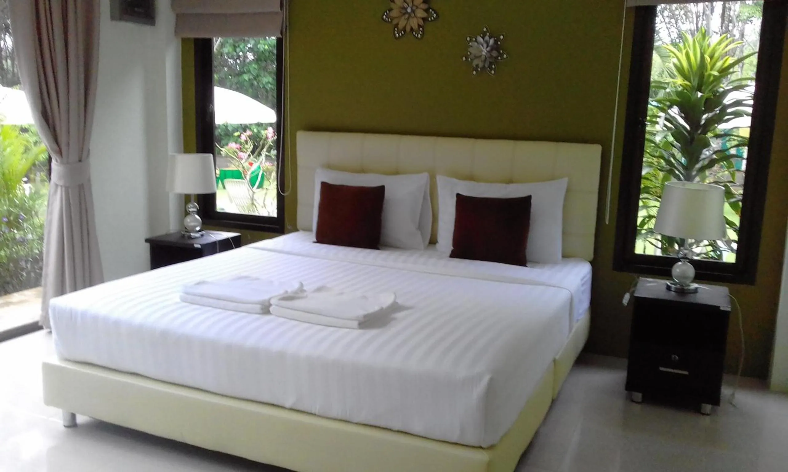 Bed in Phuket Sirinapha Resort