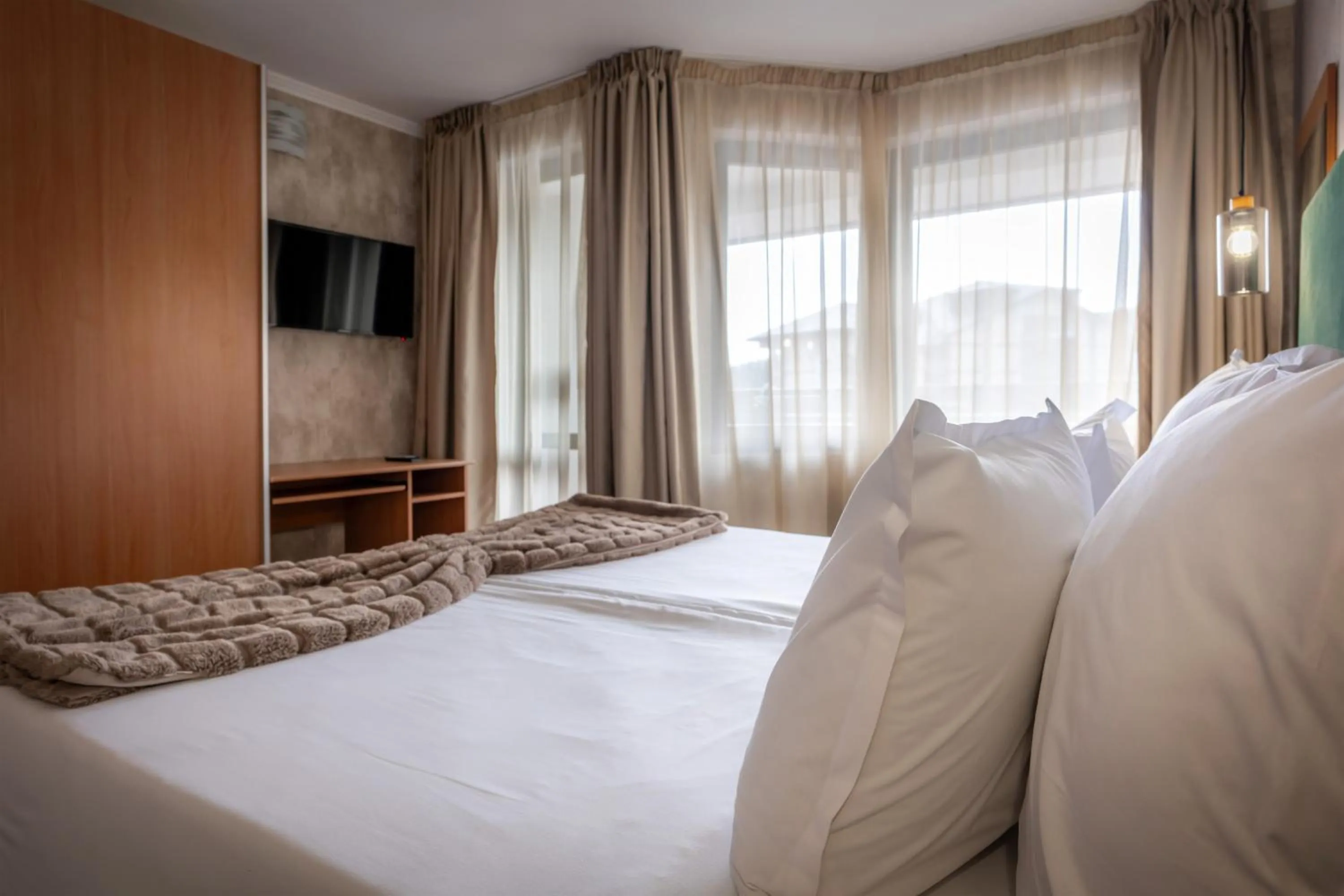 Bed in Snezhanka Hotel Pamporovo - Half Board & Swimming pool