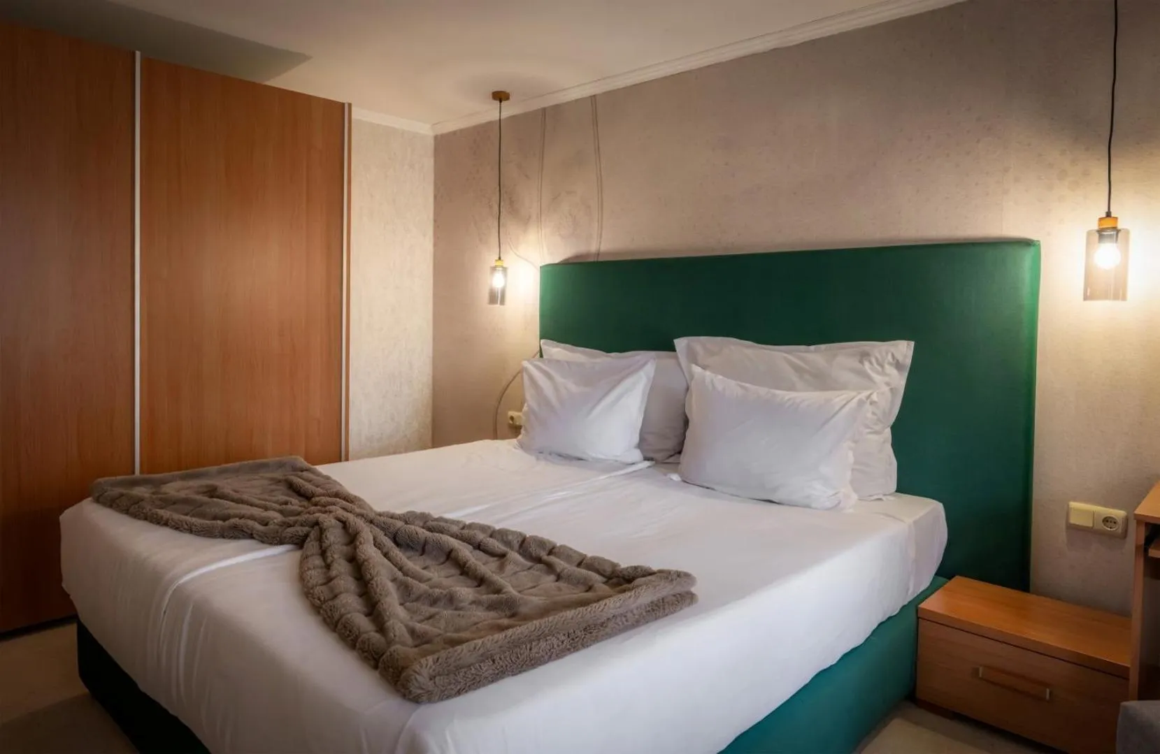 Bed in Snezhanka Hotel Pamporovo - Half Board & Swimming pool