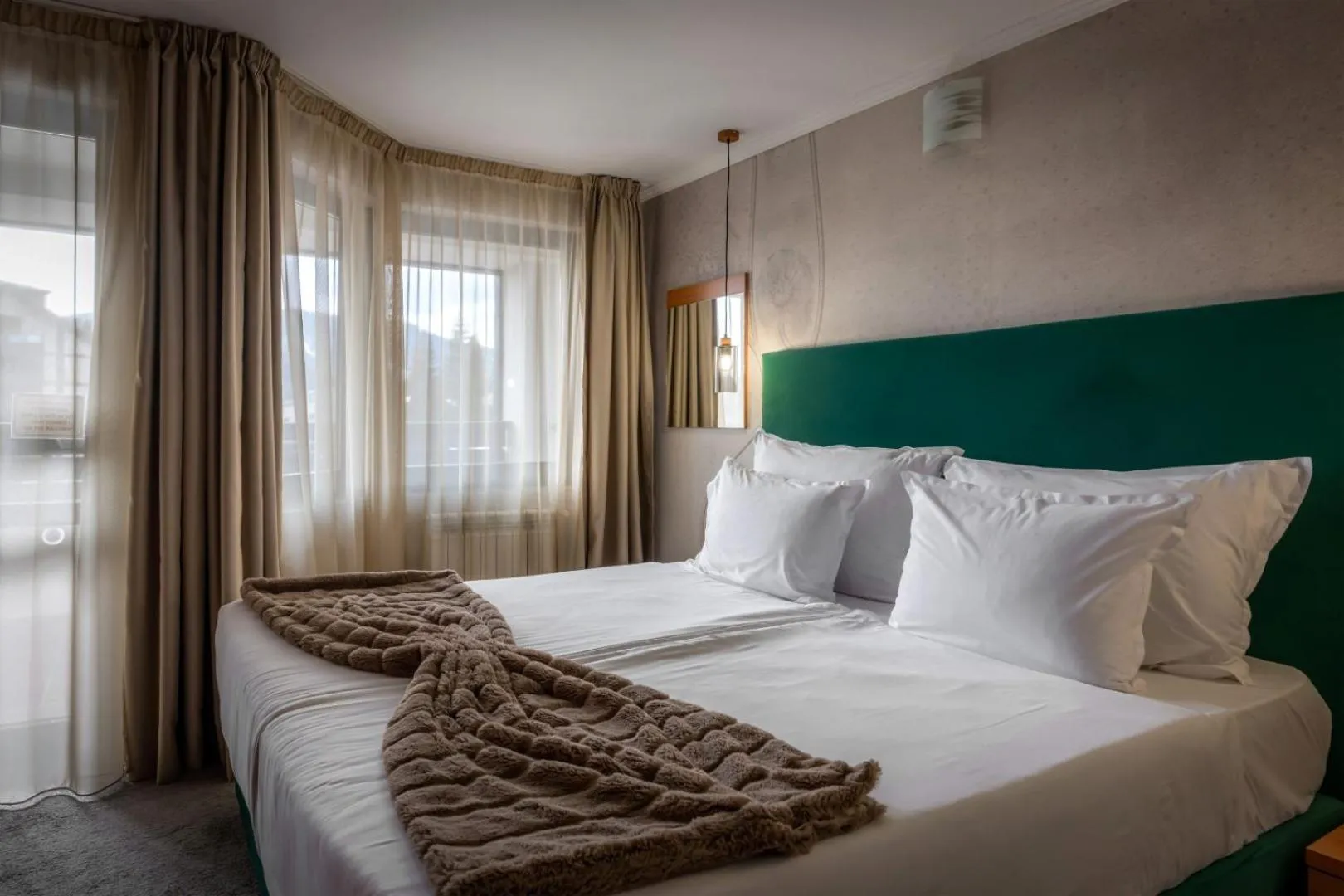 Bed in Snezhanka Hotel Pamporovo - Half Board & Swimming pool