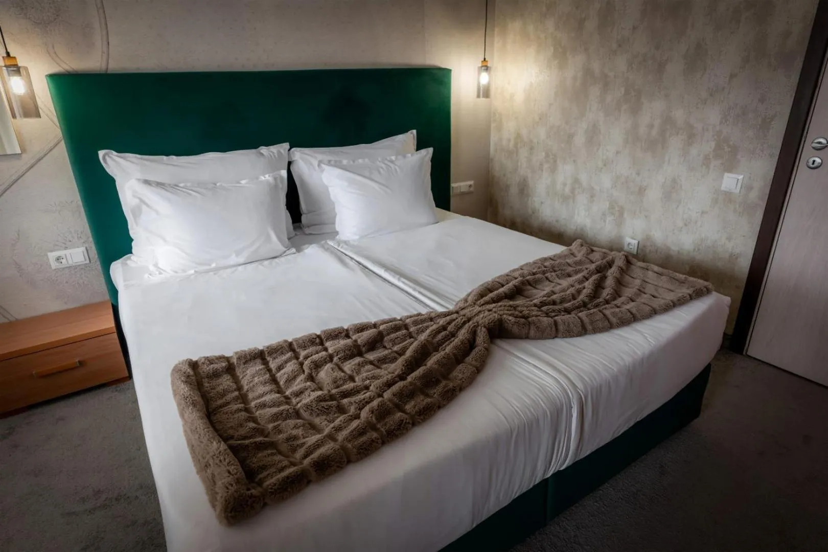 Bed in Snezhanka Hotel Pamporovo - Half Board & Swimming pool