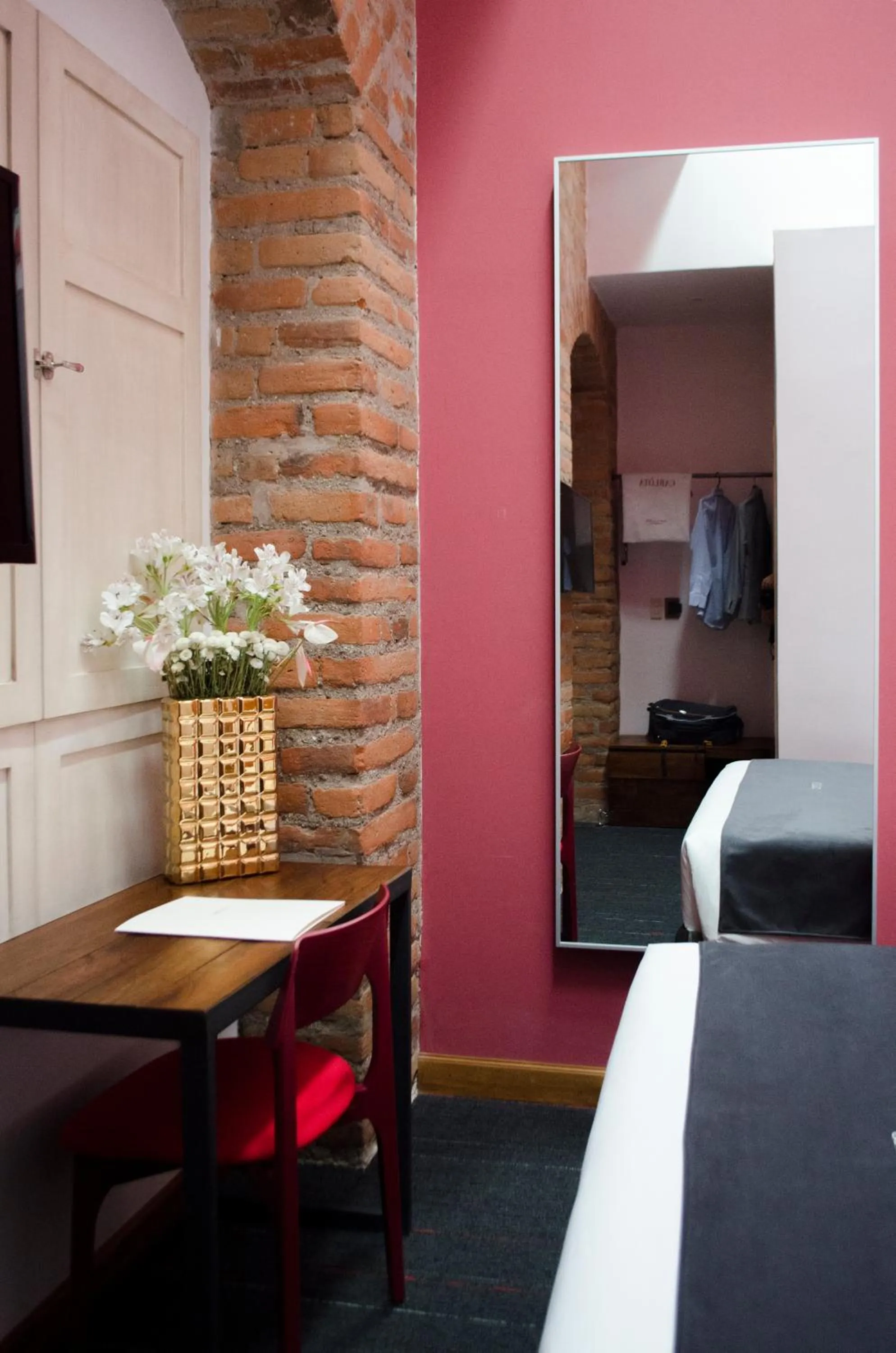 Decorative detail, Bed in Carlota Sustainable Design Hotel