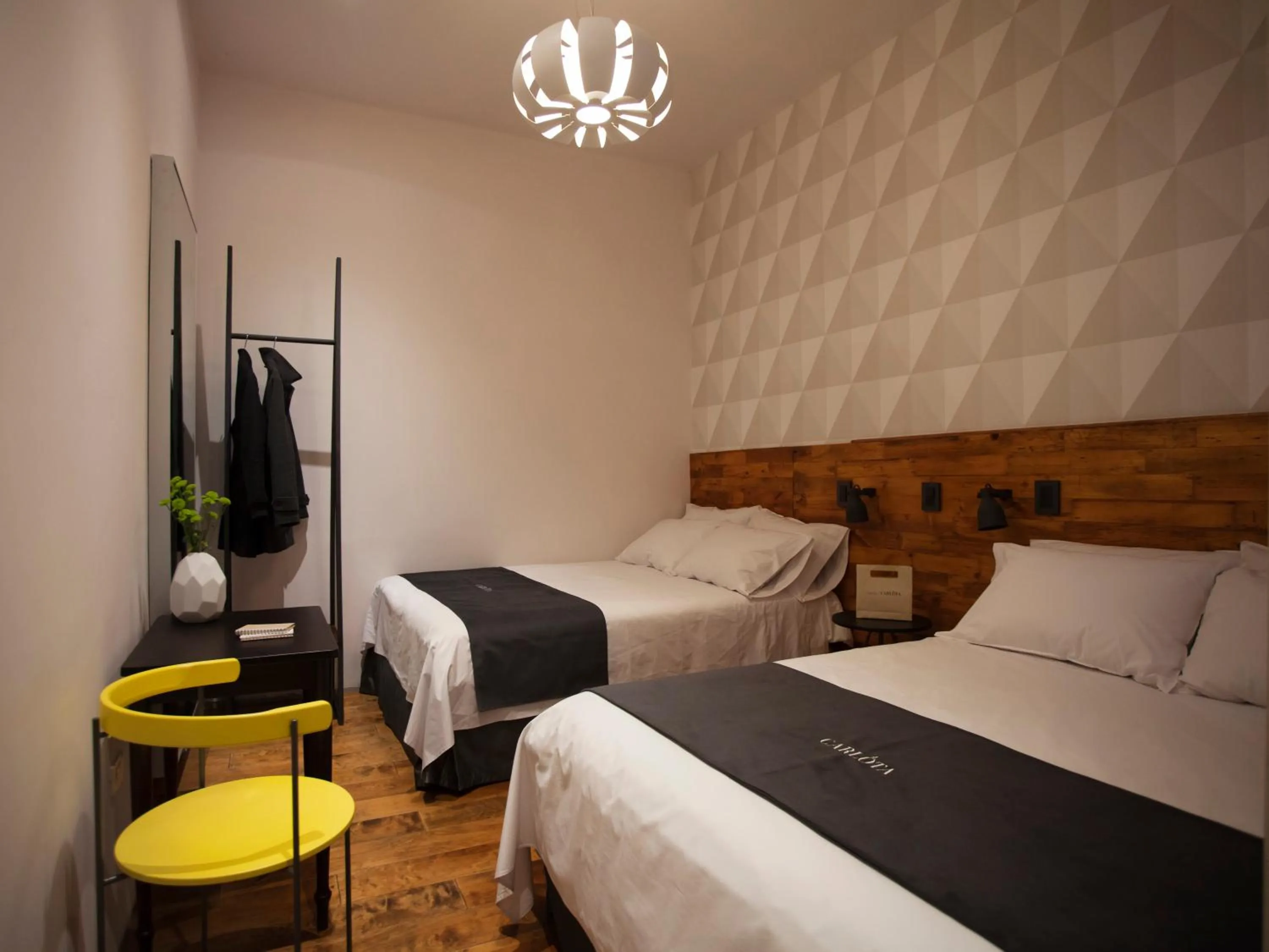 Bed in Carlota Sustainable Design Hotel