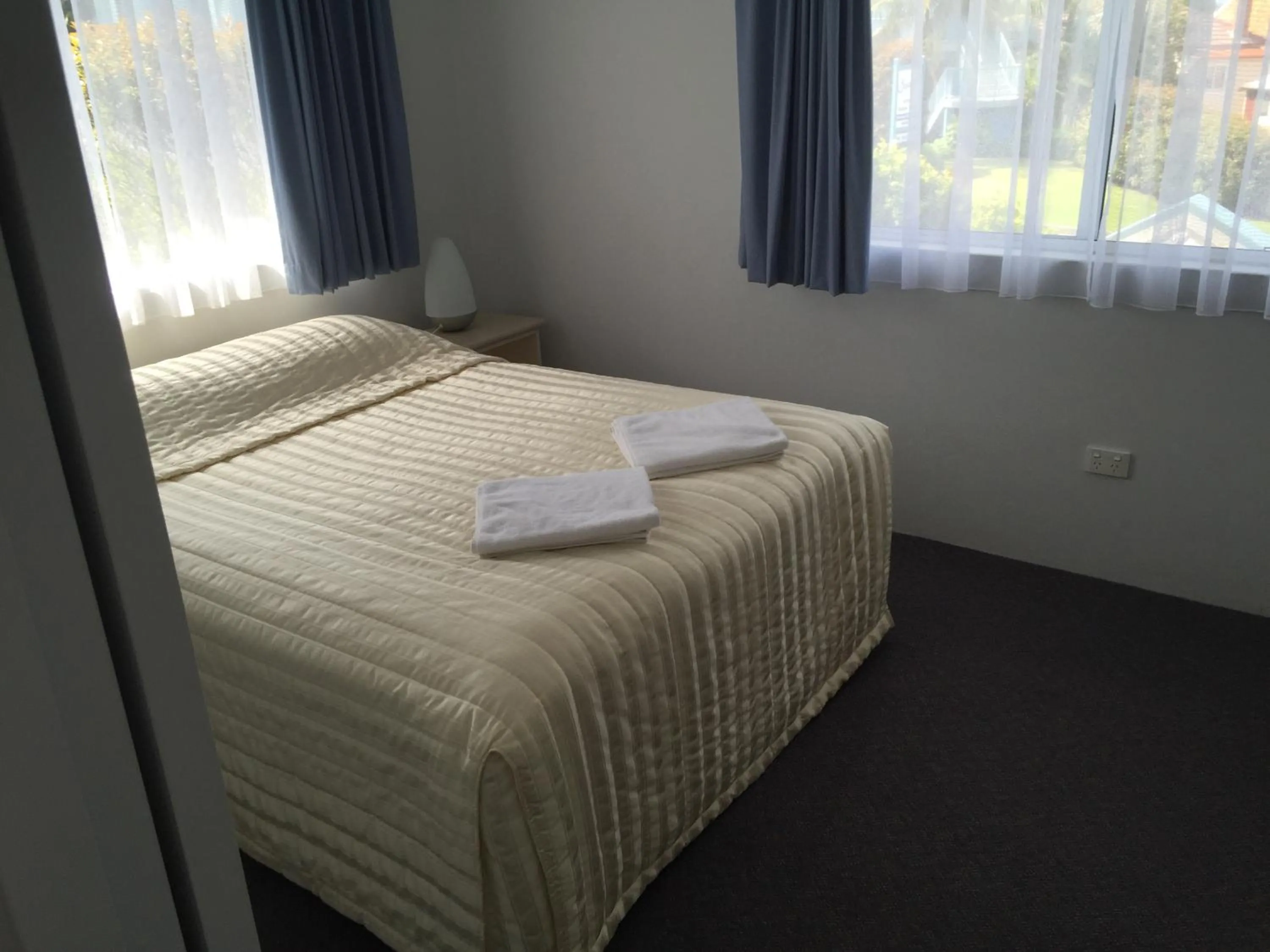 Bed in Aquarius Apartments Mollymook