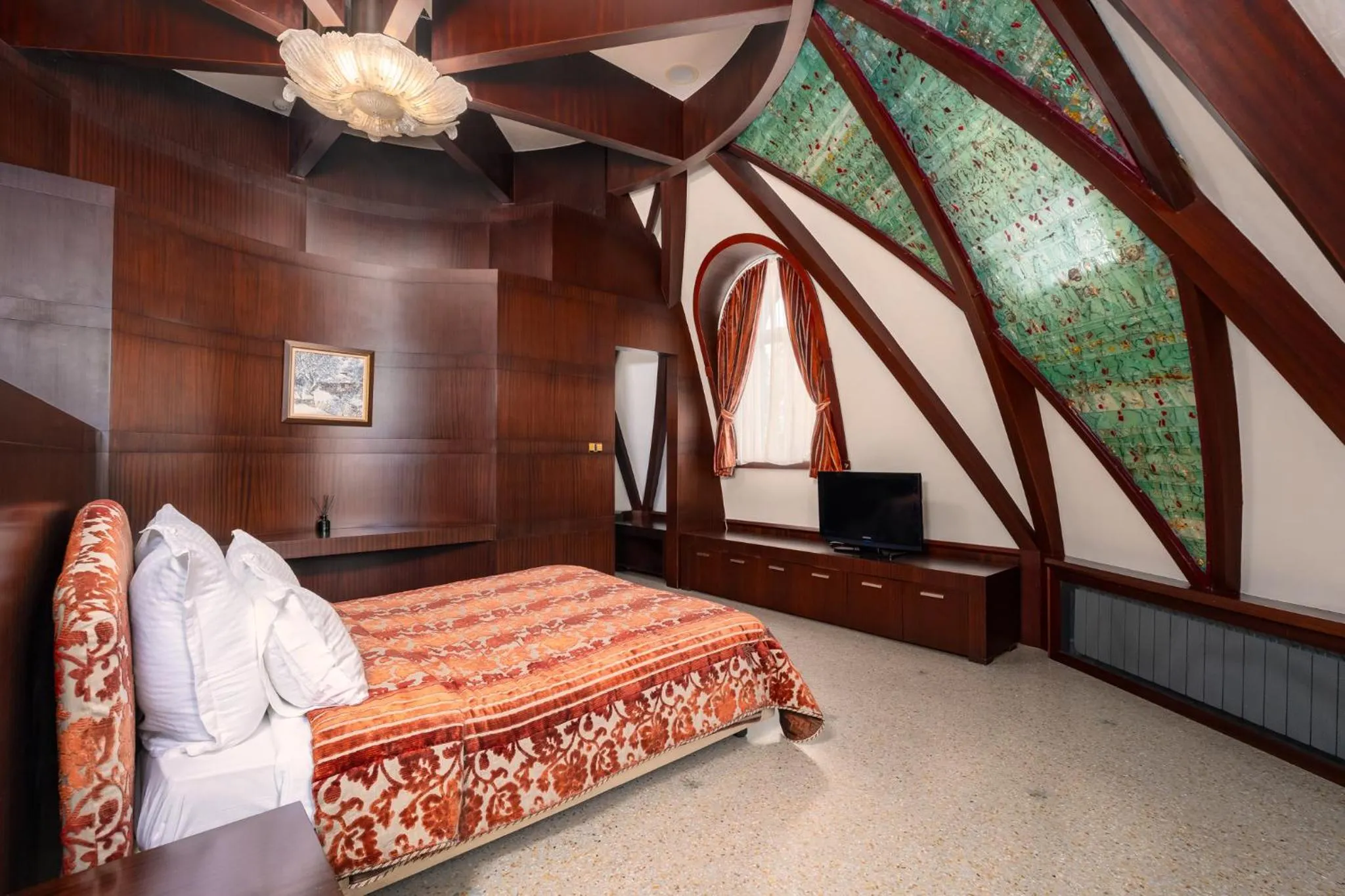 Bed in Festa Winter Palace Hotel