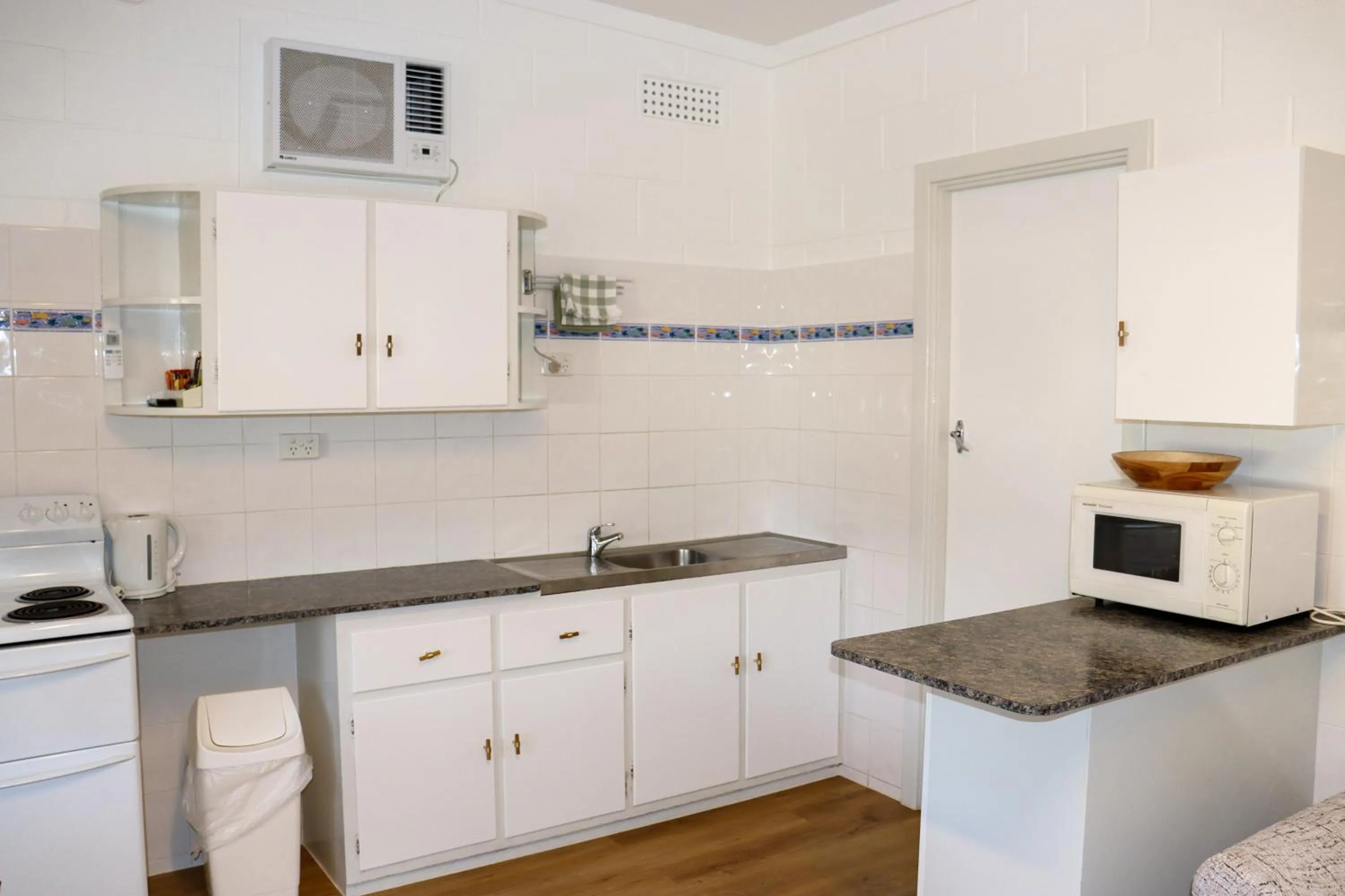 Kitchen or kitchenette in Modra's Apartments