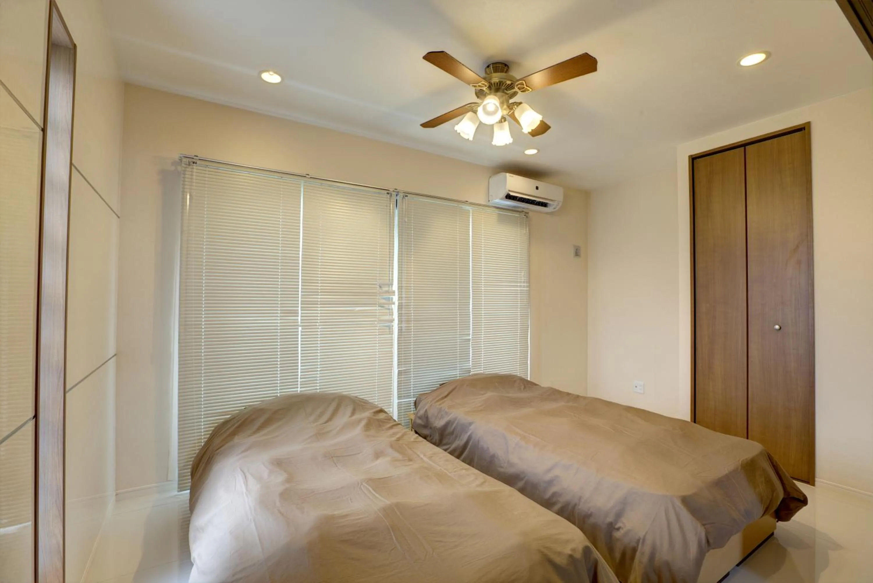 Bed in Terrace Resort Ginowan