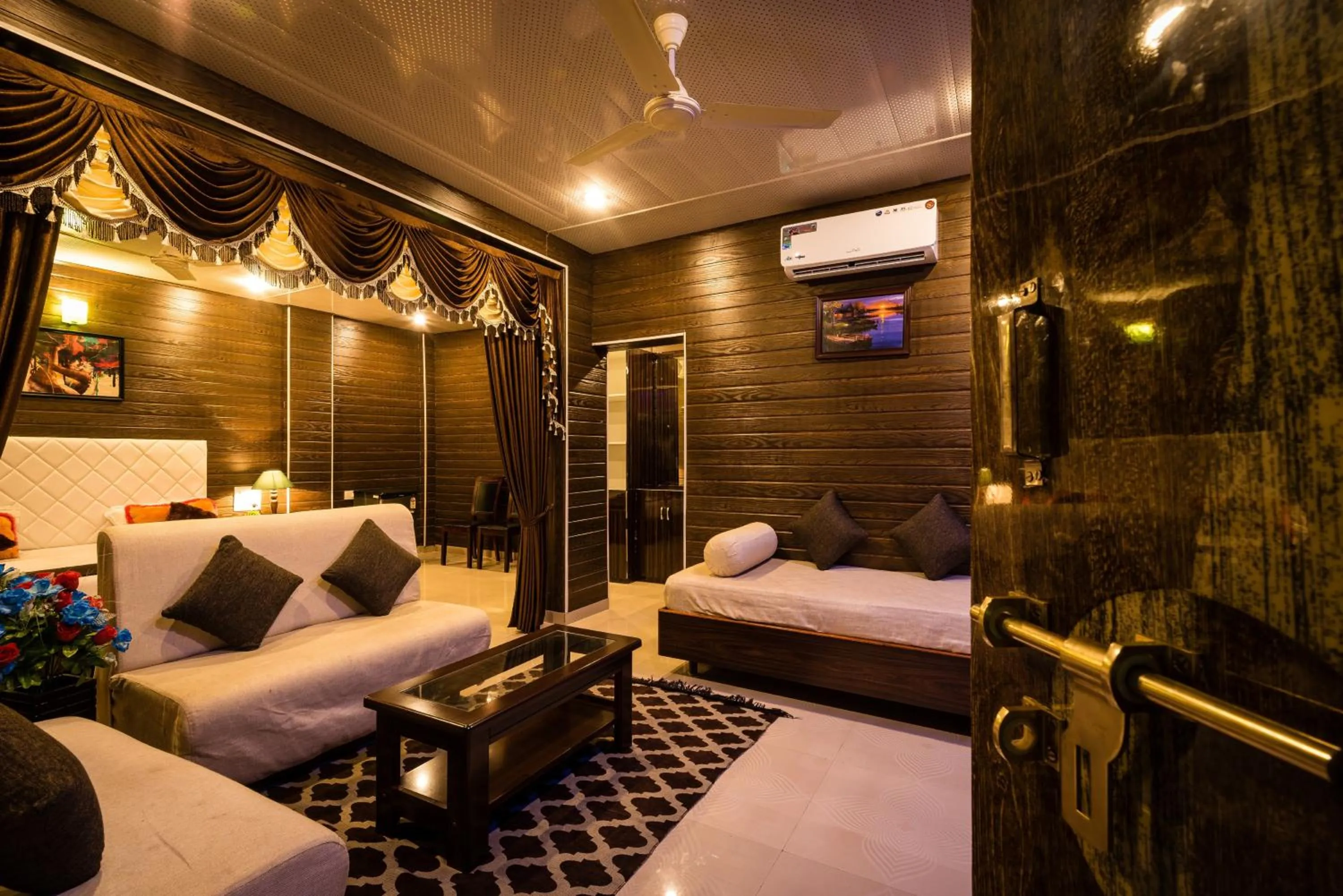 Photo of the whole room, Bed in Sai Atithi Resort