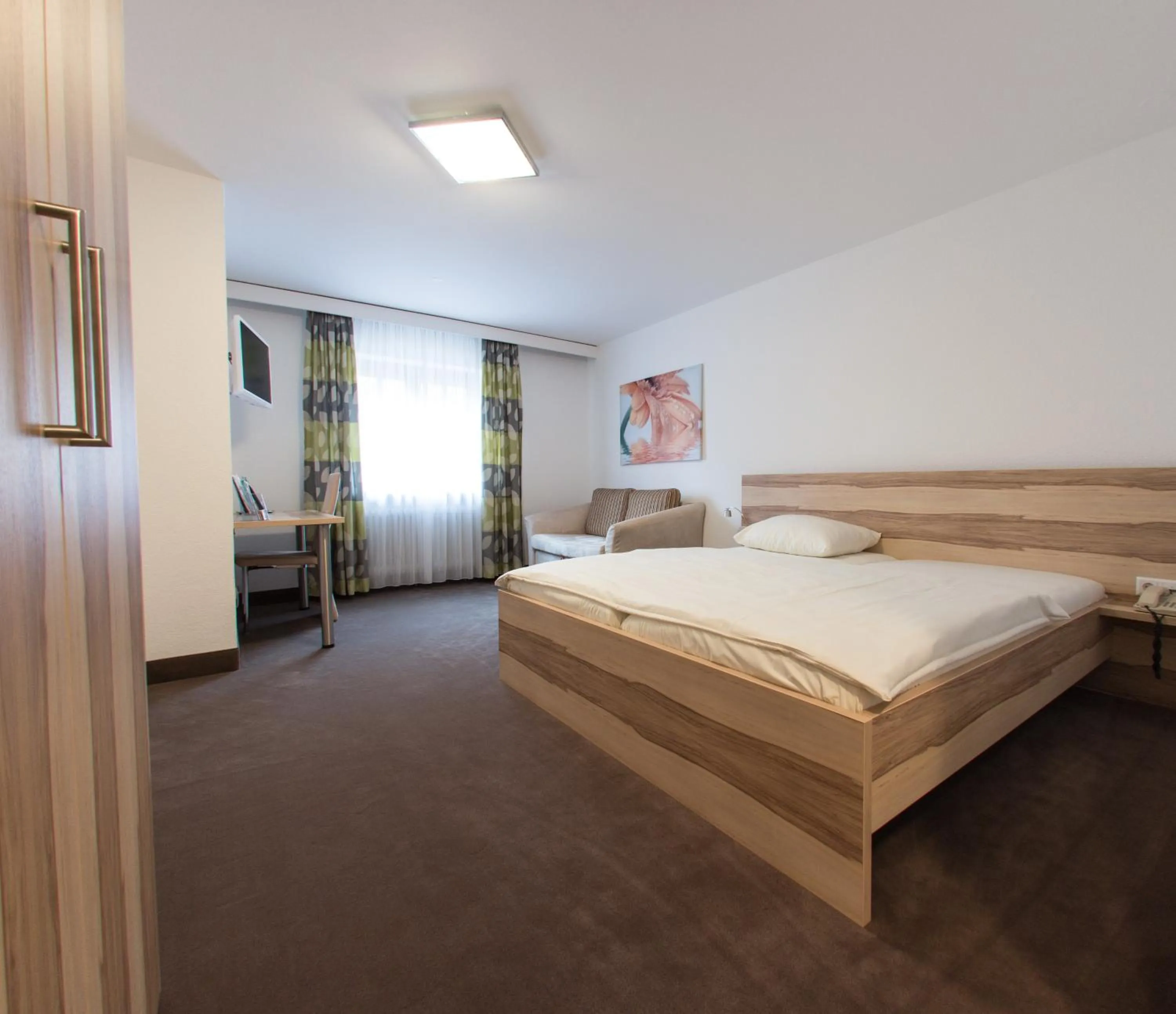 Photo of the whole room, Bed in Hotel Stadt Tuttlingen