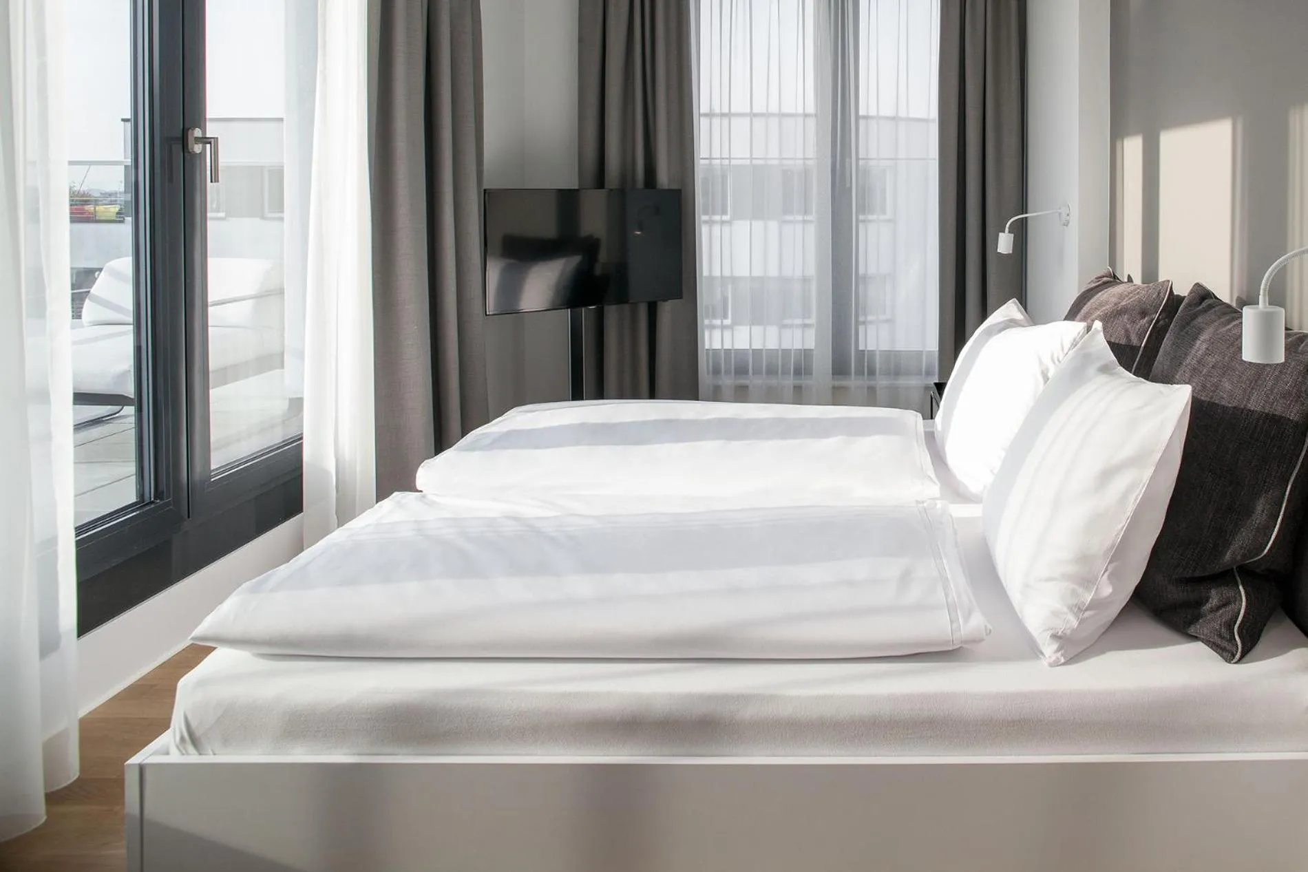 Photo of the whole room, Bed in AMANO HOME Apartments