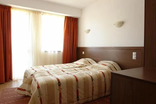 Bed in Winslow Elegance Apartments