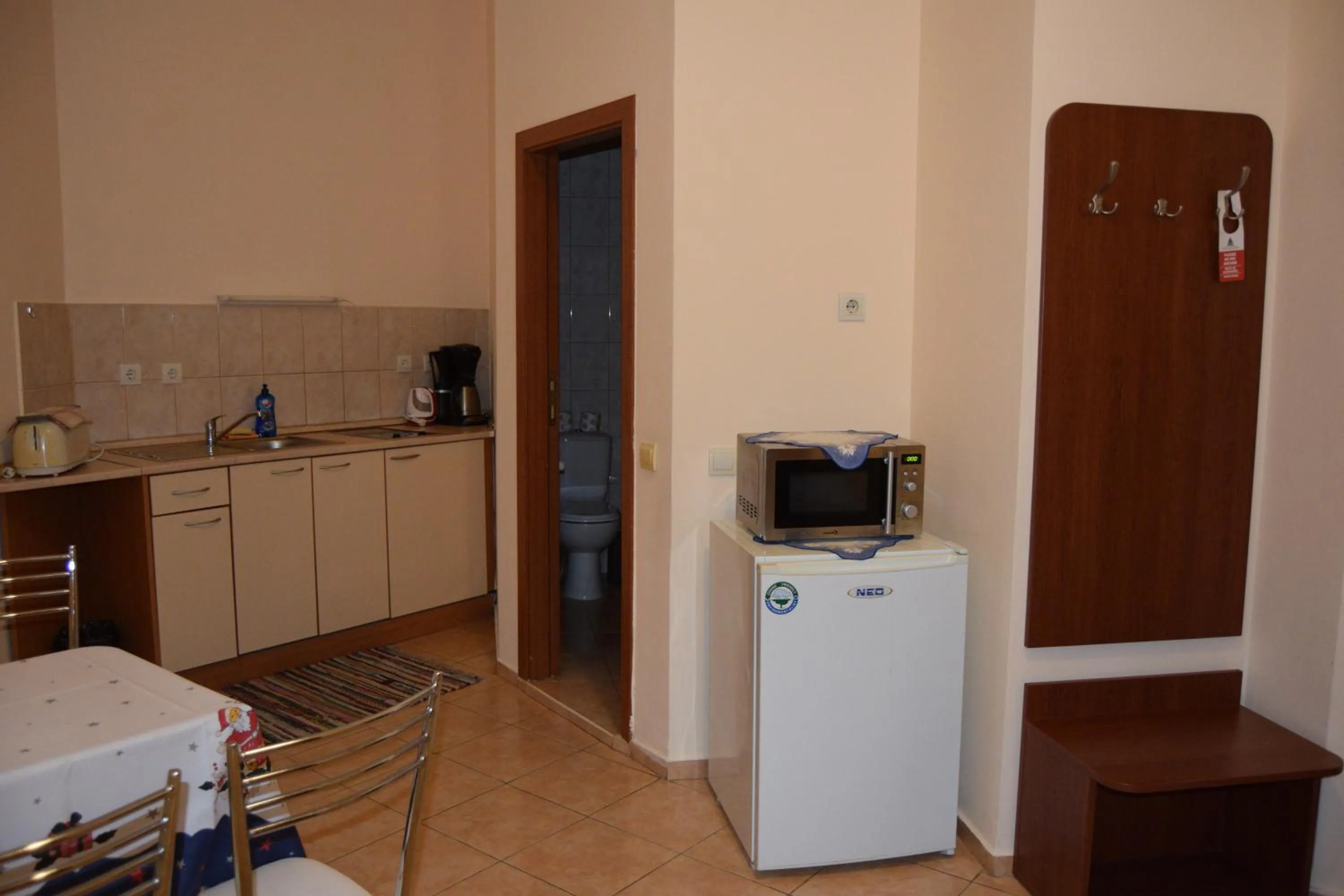 Kitchen or kitchenette in Persey Flora Apartments