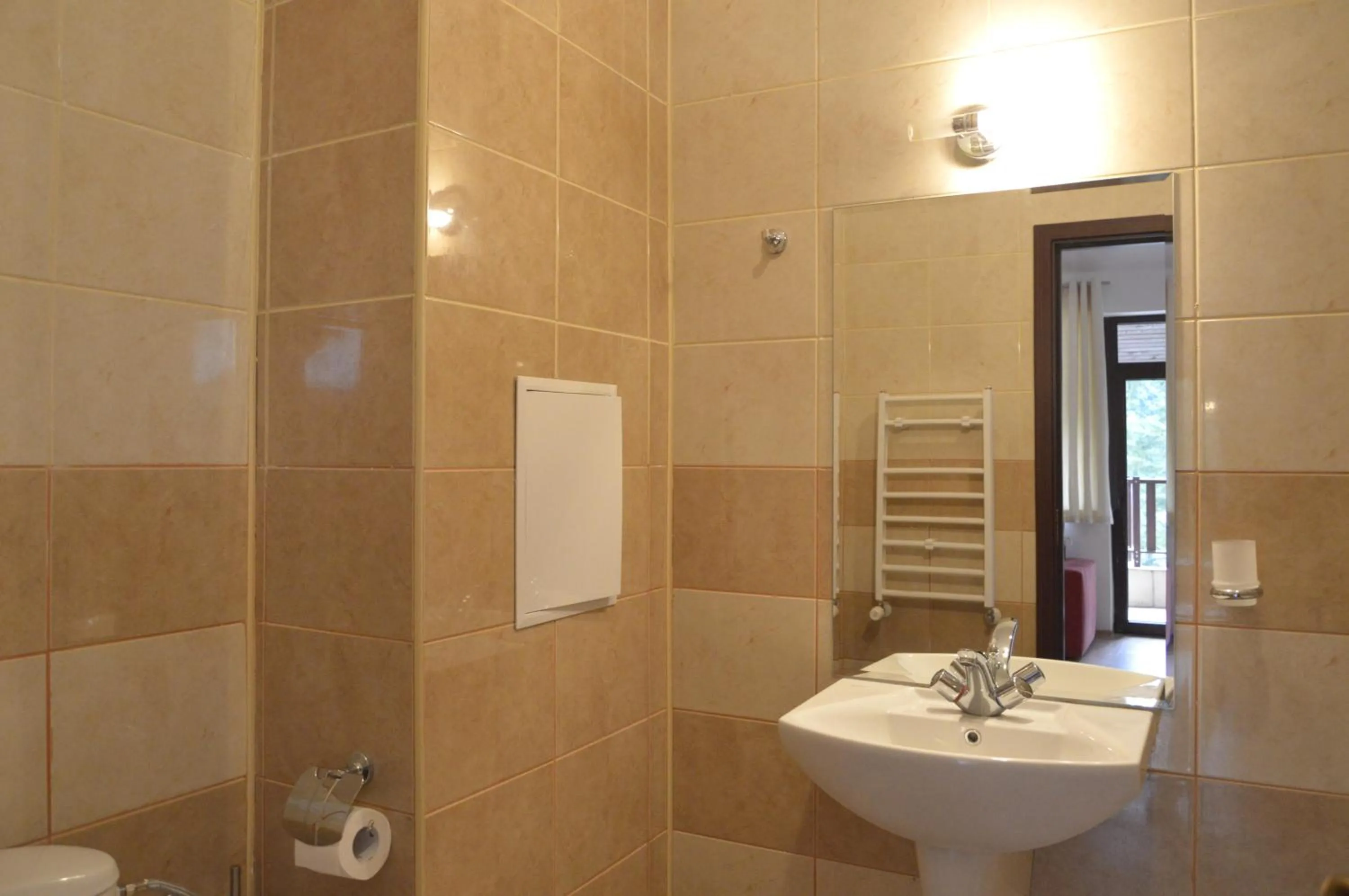 Bathroom in Persey Flora Apartments