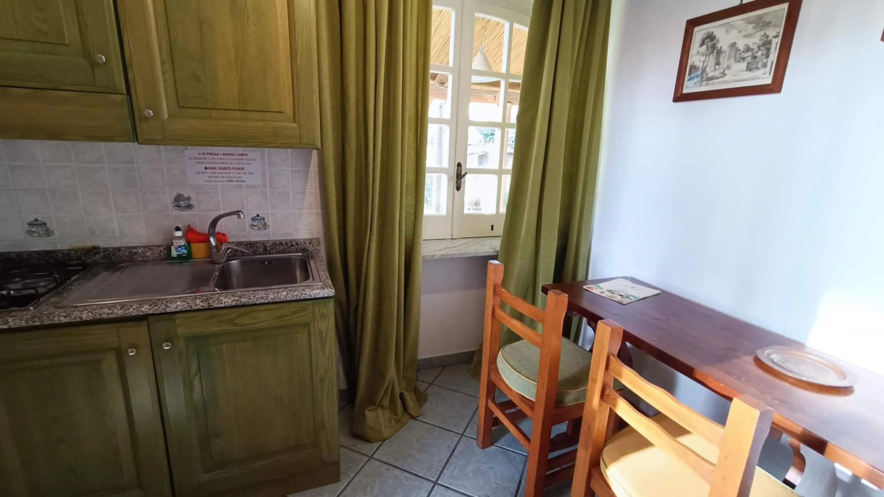 Kitchen or kitchenette in Residence Villa Cristina