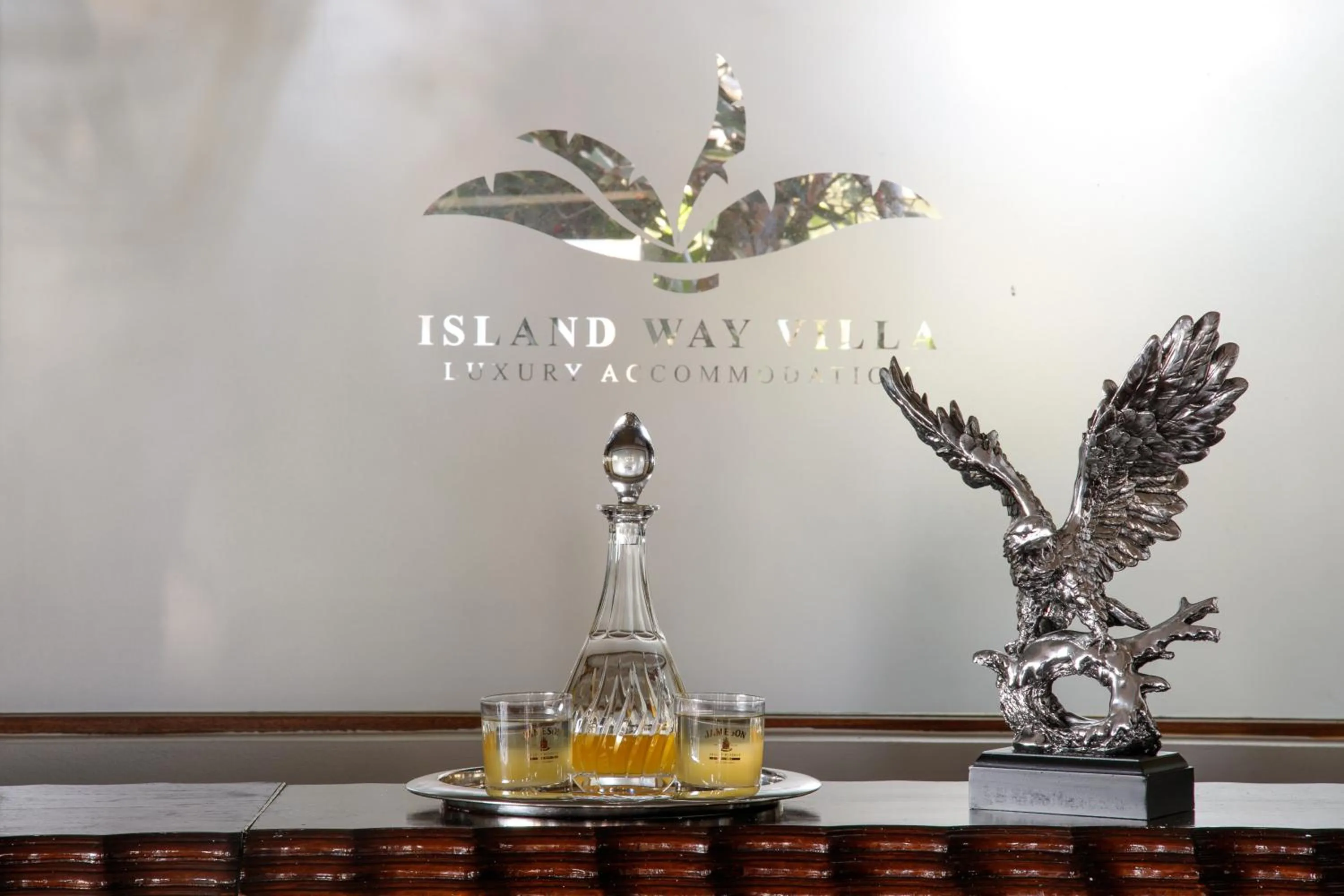 Property logo or sign in Island Way Villa