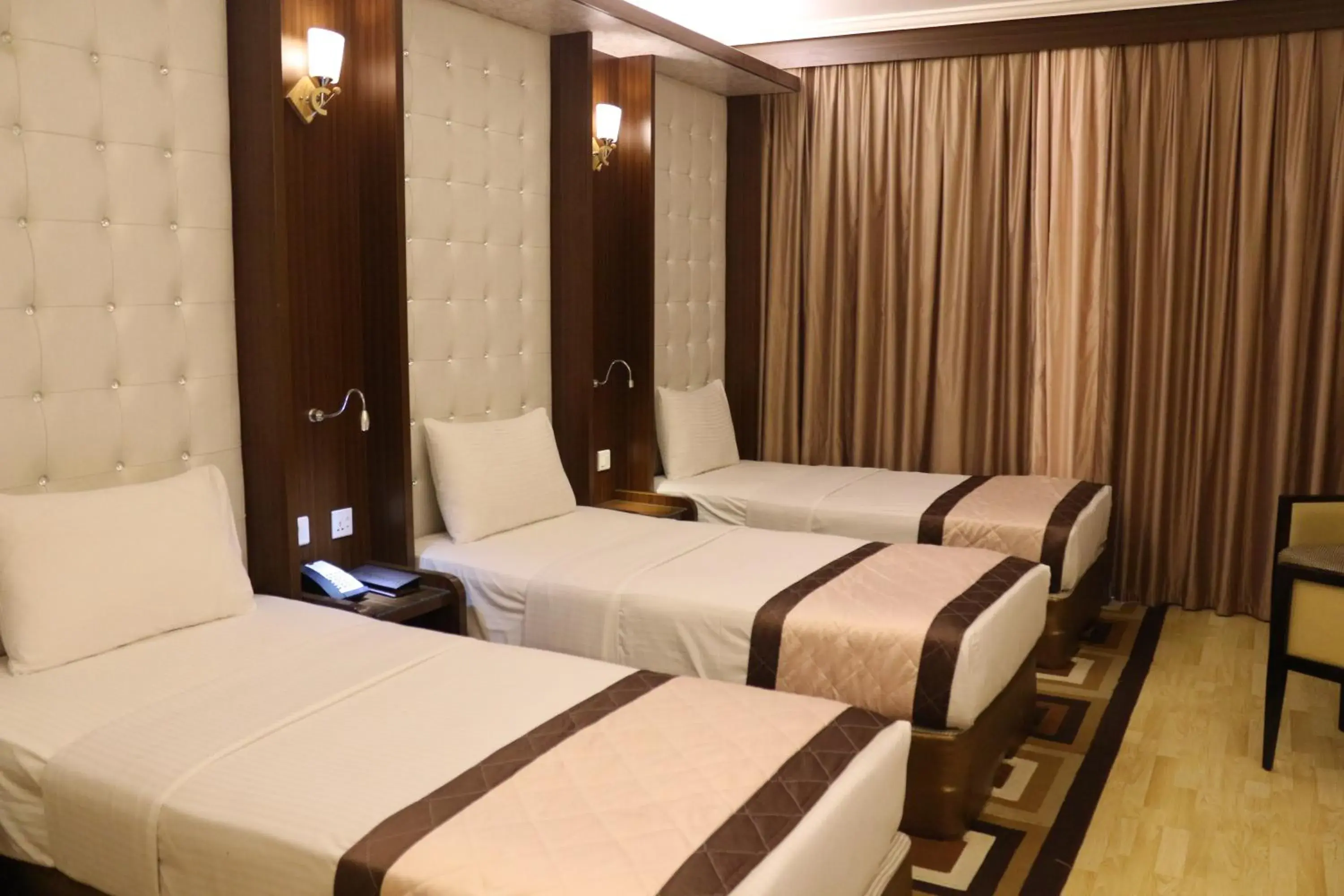 Standard Quadruple Room with Balcony in Al Khaleej Grand Hotel Standard Quadruple Room with Balcony in Al Khaleej Grand Hotel