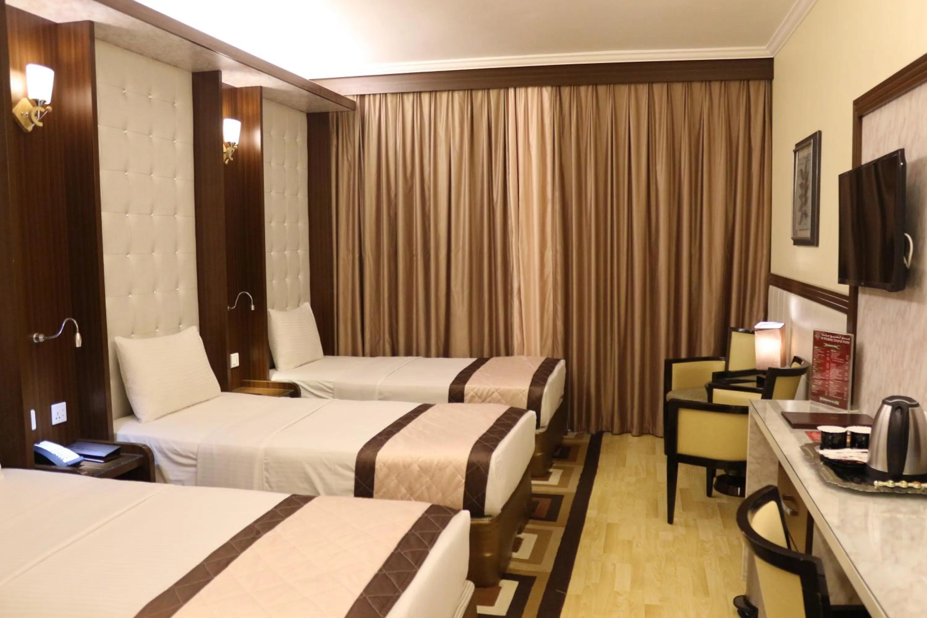 Bed in Al Khaleej Grand Hotel