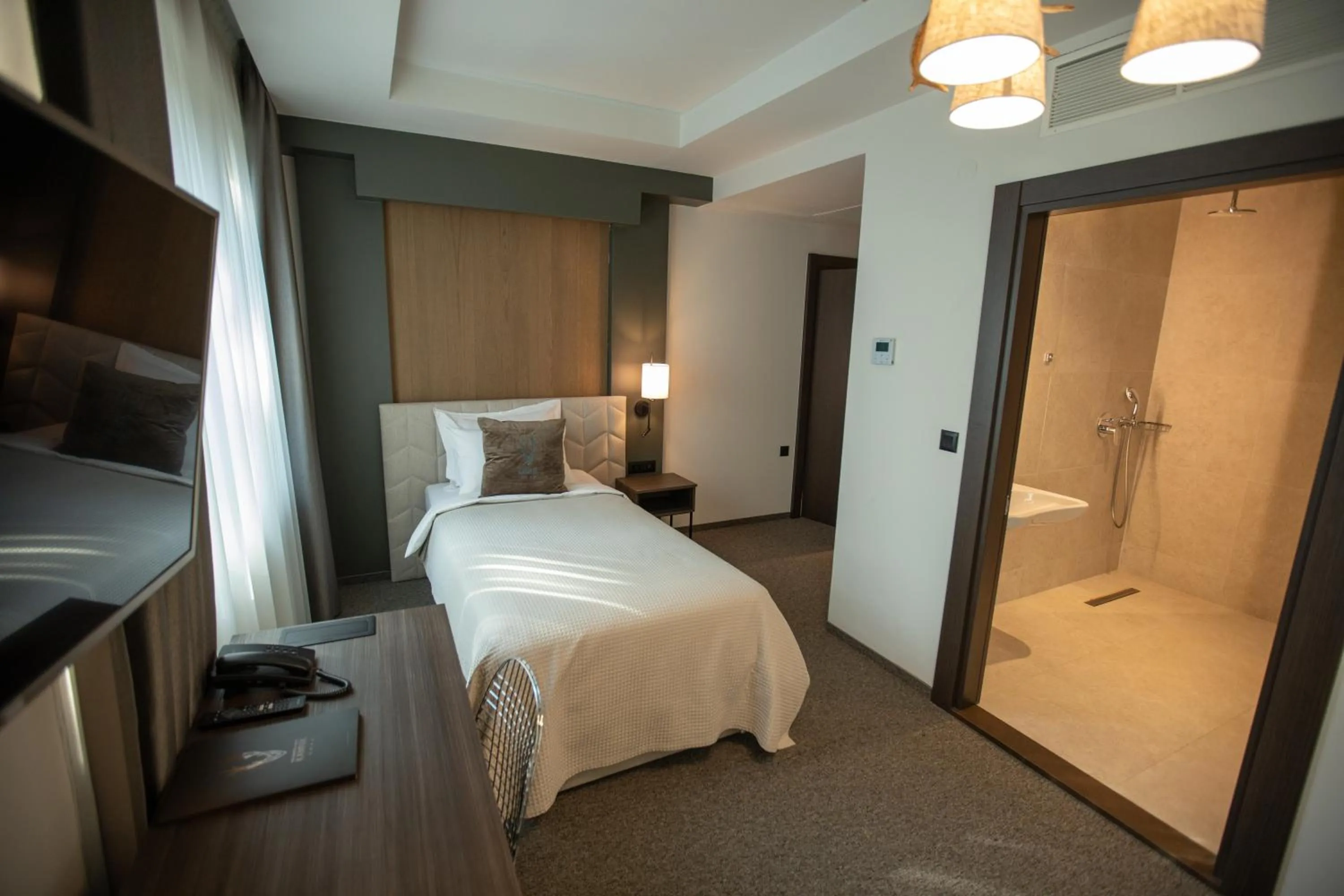 Bed in The Hunter's Lodge Kamnik