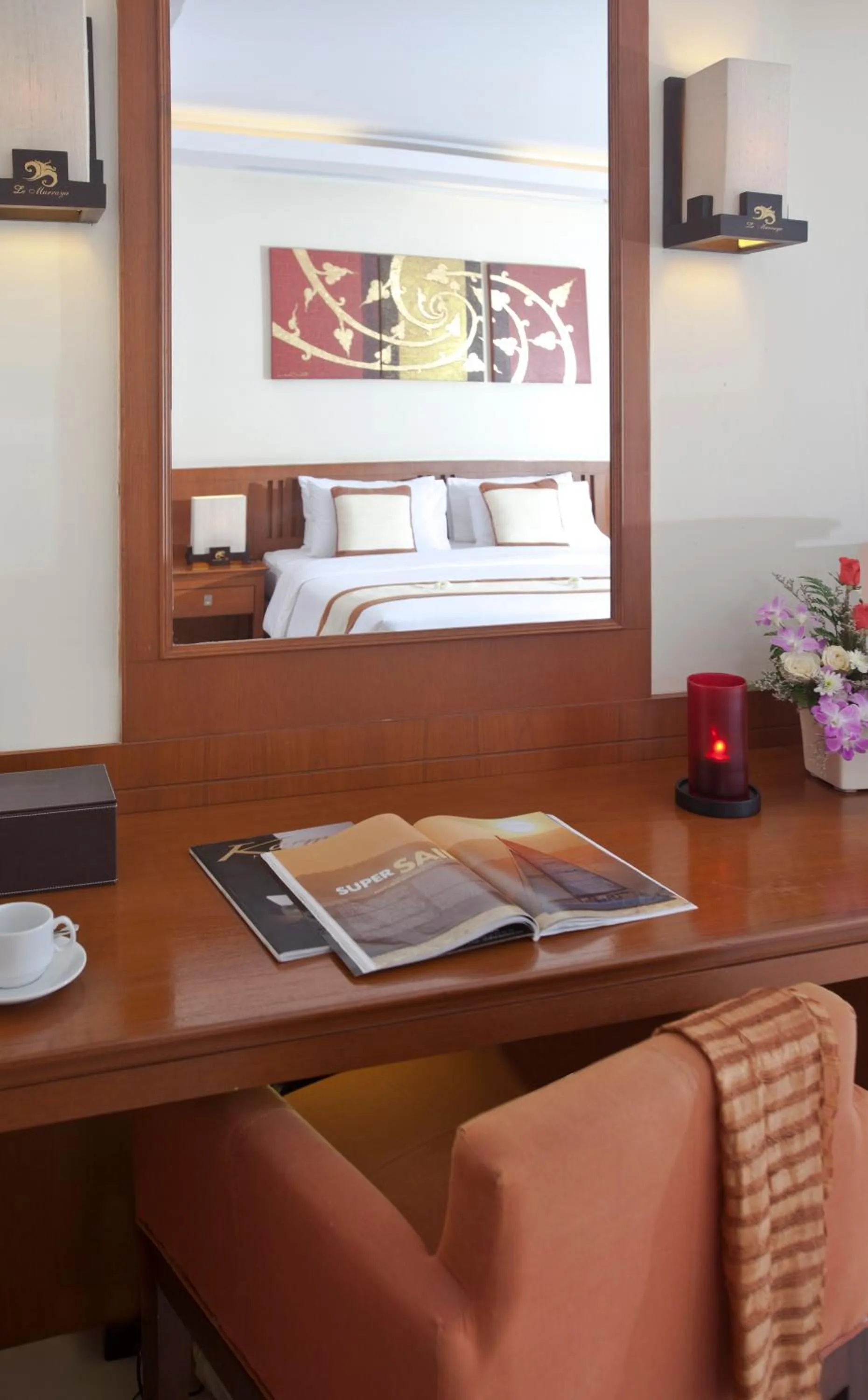 Seating area, Bed in Le Murraya Boutique Serviced Residence & Resort