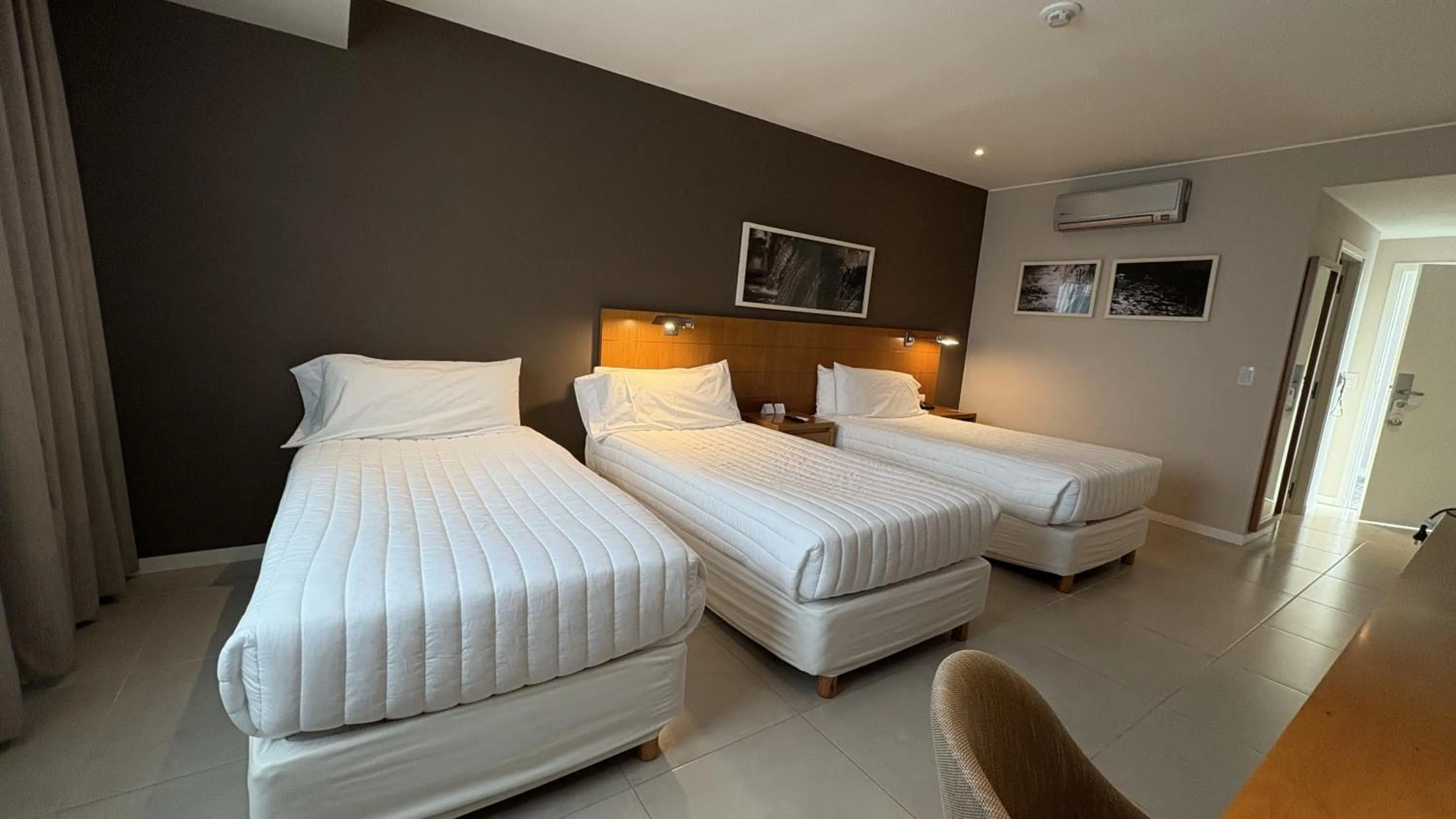 Bedroom, Bed in Orfeo Suites Hotel Sierras Chicas