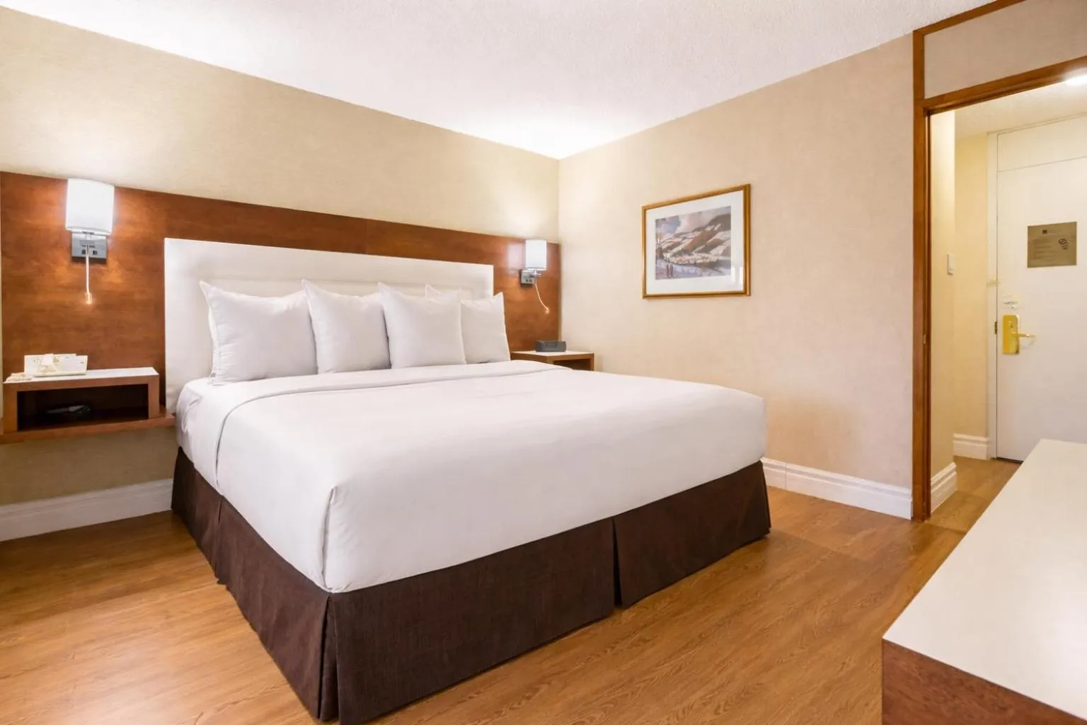 Bed in Quality Inn & Suites