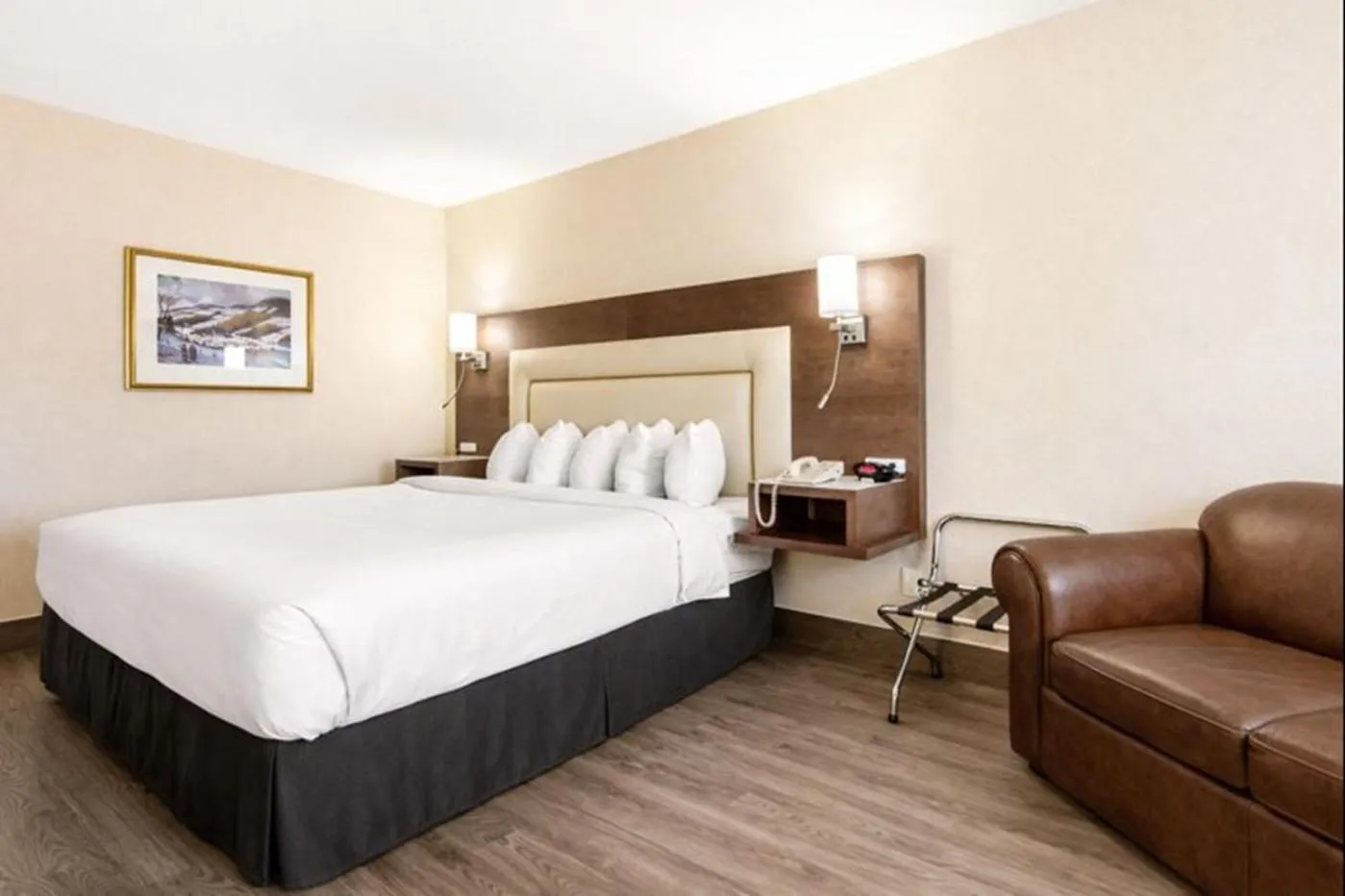 Bed in Quality Inn & Suites