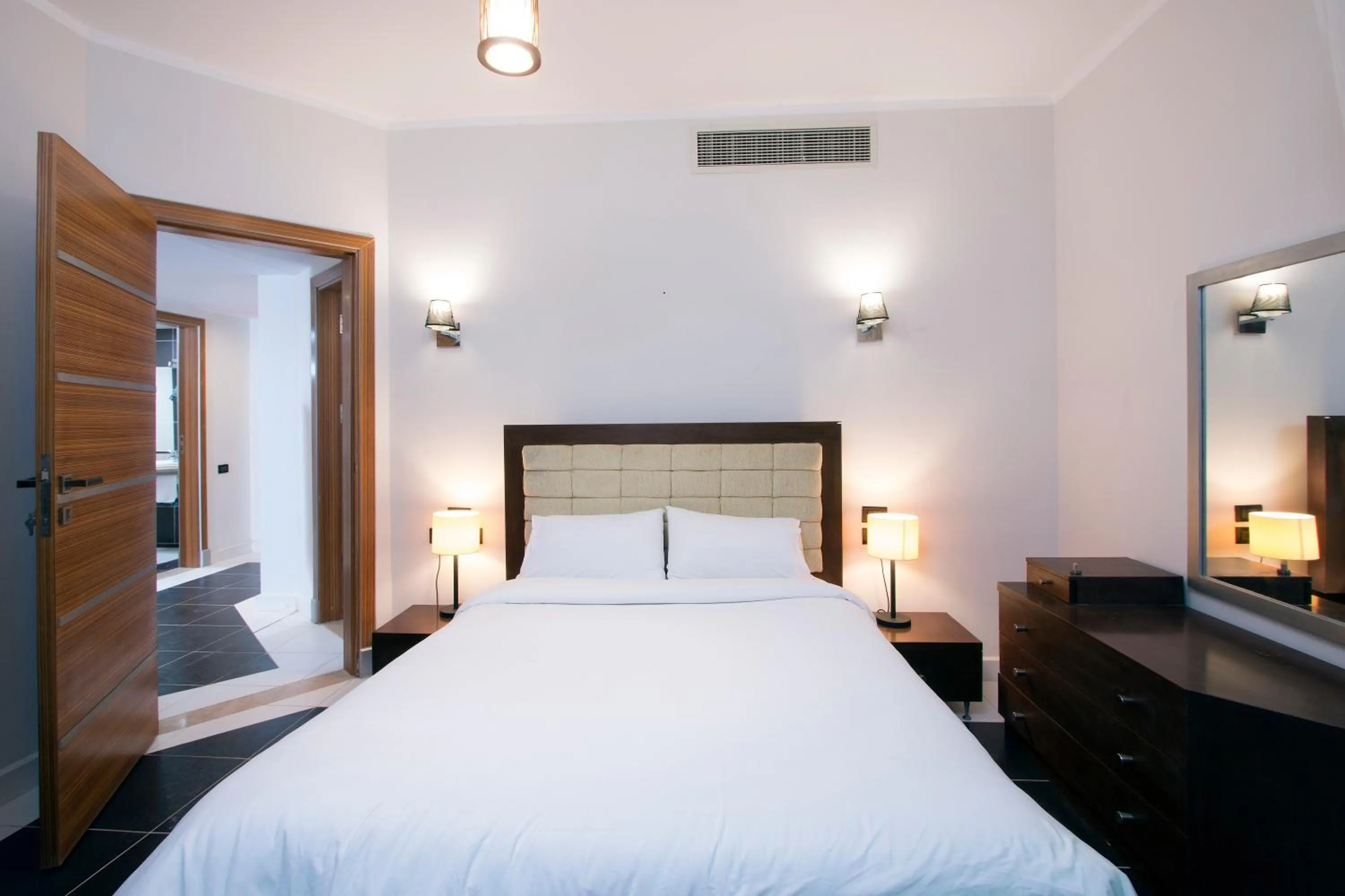 Bed in Royal Beach Serviced Apartments