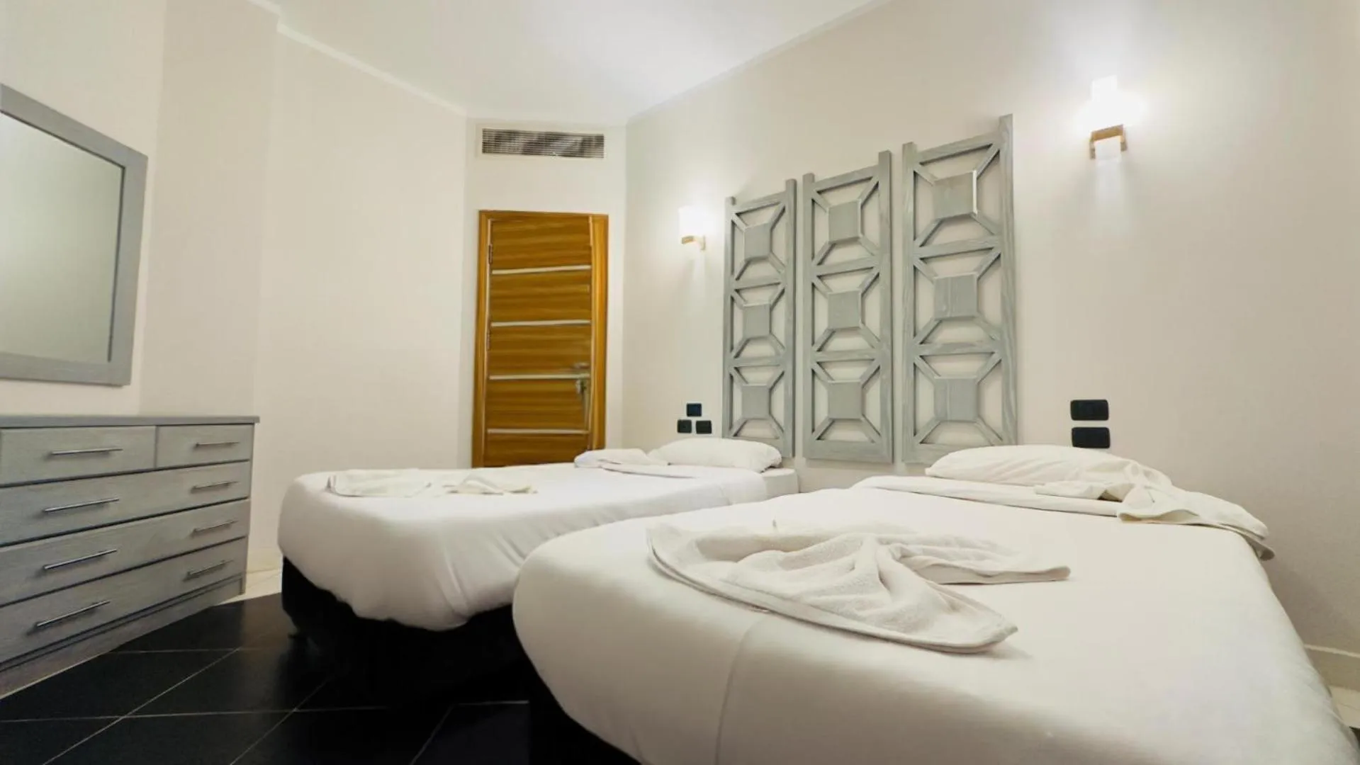 Bed in Royal Beach Serviced Apartments