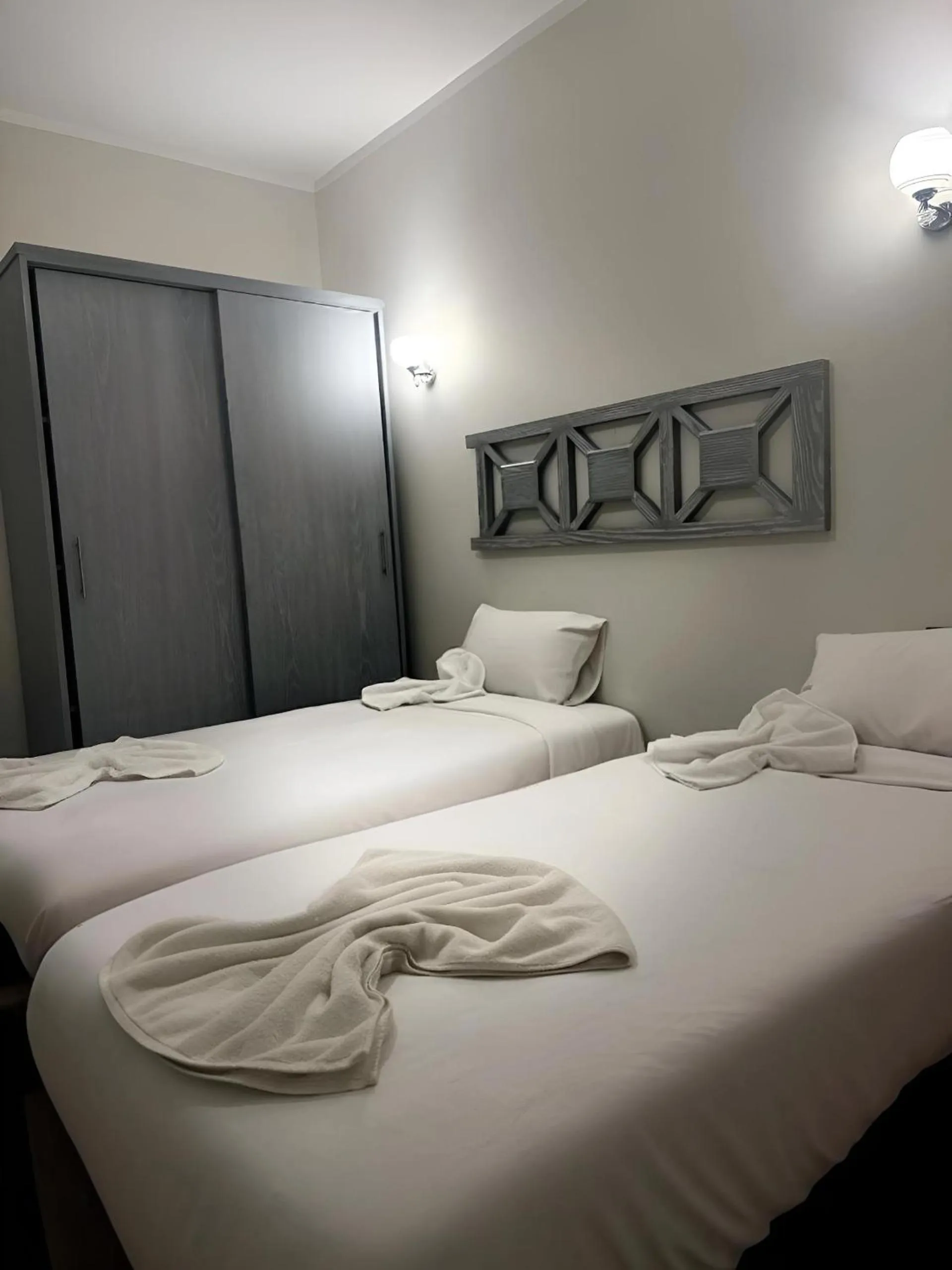 Bed in Royal Beach Serviced Apartments
