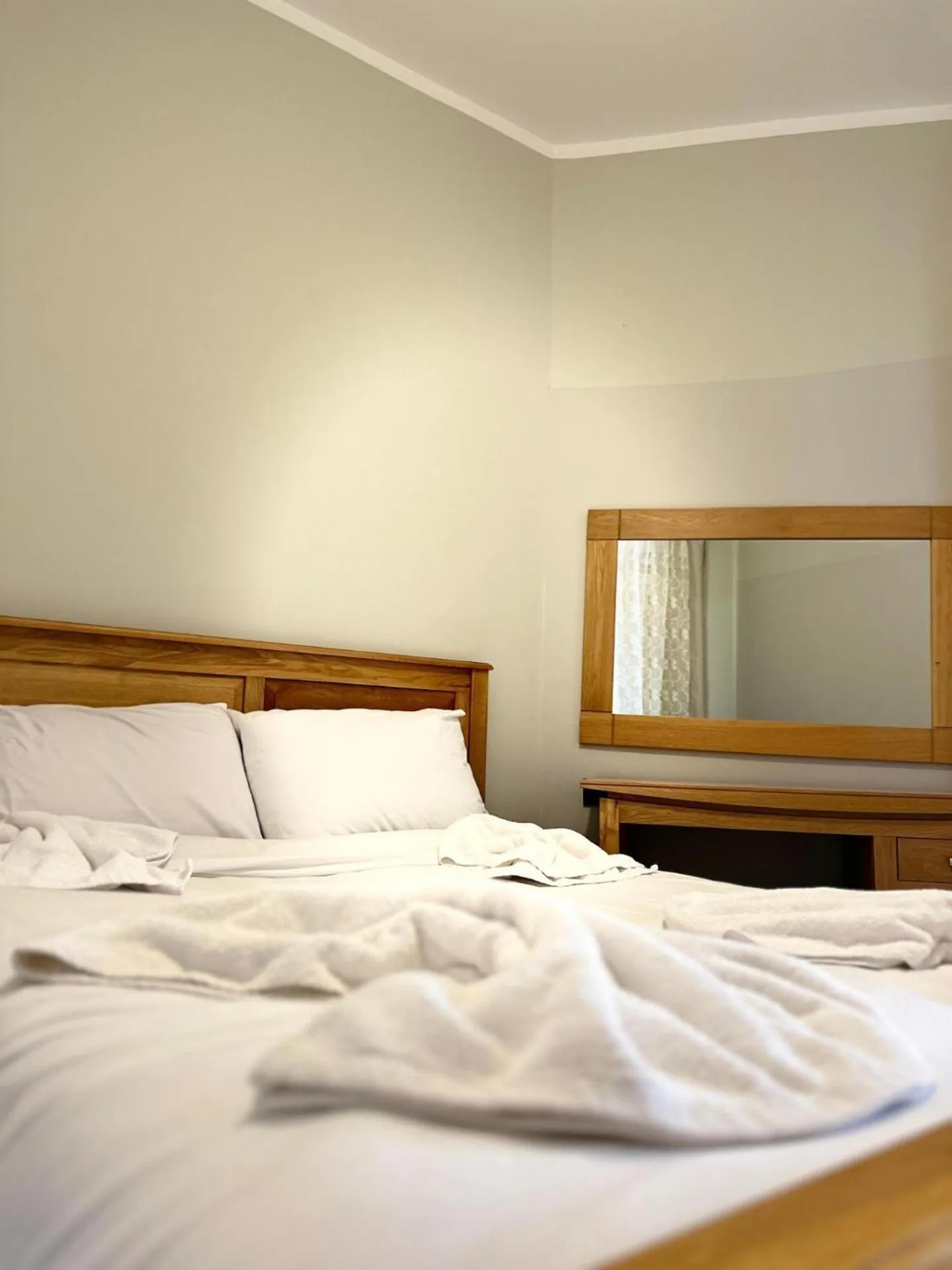 Bed in Royal Beach Serviced Apartments